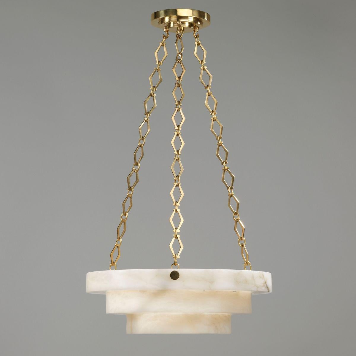Understated in style, with a fine hand-finished Italian alabaster bowl suspended from nickel-plated diamond-shaped chains. All components are produced from solid cast brass, for the highest standard of quality and durability. This light is