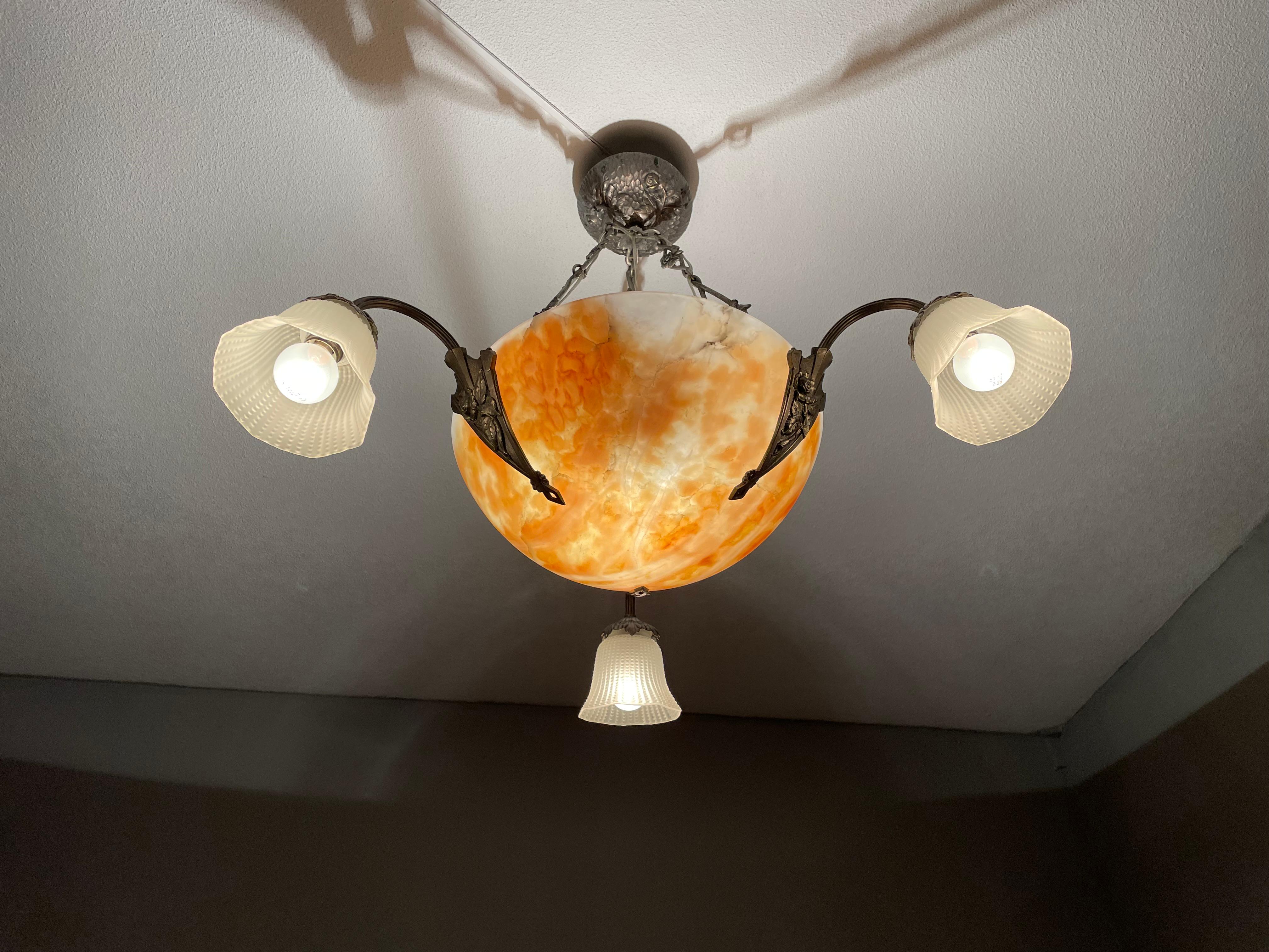 Truly elegant, four light, alabaster pendant with nickel plated rose sculptures.

This outstanding and highly stylish chandelier originates from early twentieth century France and to have found it in this superb condition again felt like a