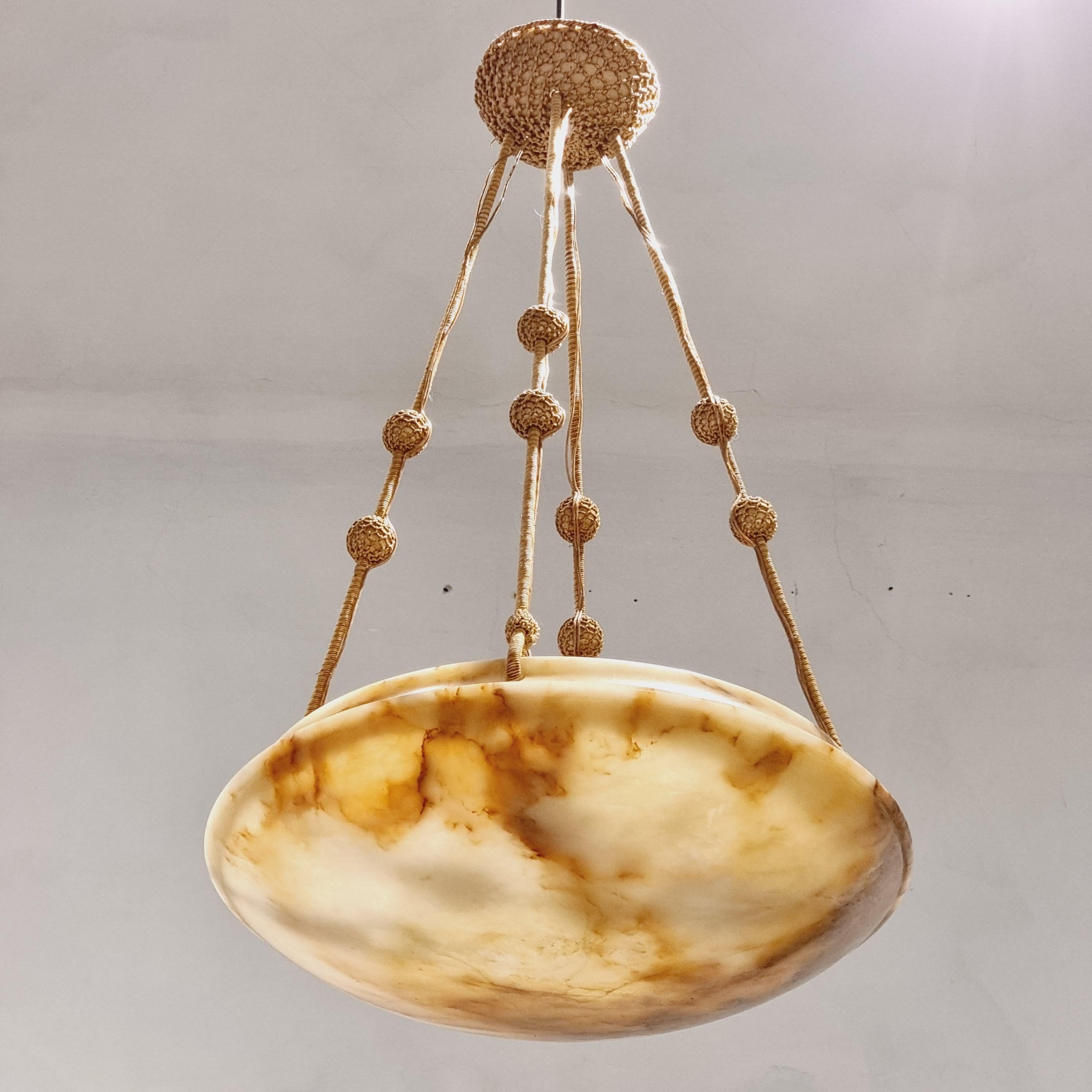 Large beautiful alabaster pendant, Swedish Art Deco. Decorative as well as a soft light source which works in most rooms, perfect for bedrooms and living rooms to give a cozy feel.

With original cords - rewired ( swedish standard). In good