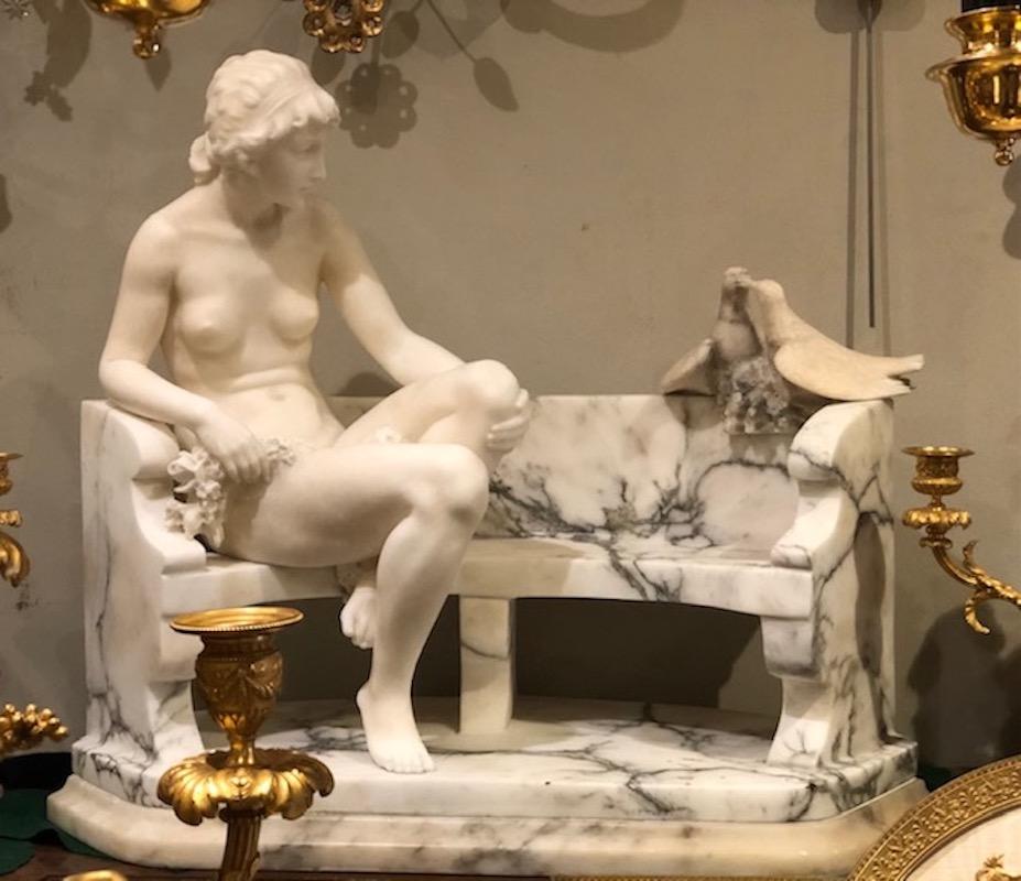 Art Deco Alabaster Sculpture of a Lady seated on a bench feeding Doves, By Alberto Saccardi, Italian, 1920

Exquisite Art Deco Alabaster sculpture of a naked lady seated upon a bench feeding doves. Her hair is loosely piled on top, and there is a