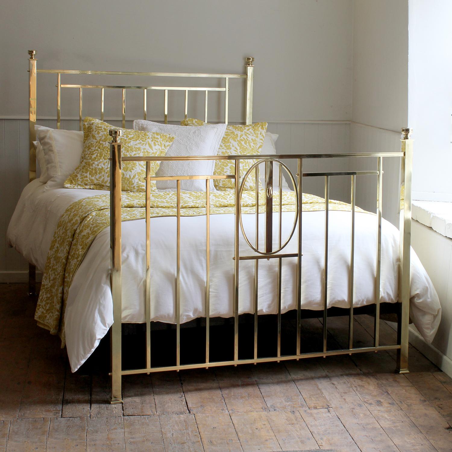 A fine example of an Art Deco all brass bed in the double size, circa 1925. The panels on the head and the foot ends are created from square section brass tube, with a central oval feature in the foot board, and the side posts are mounted with