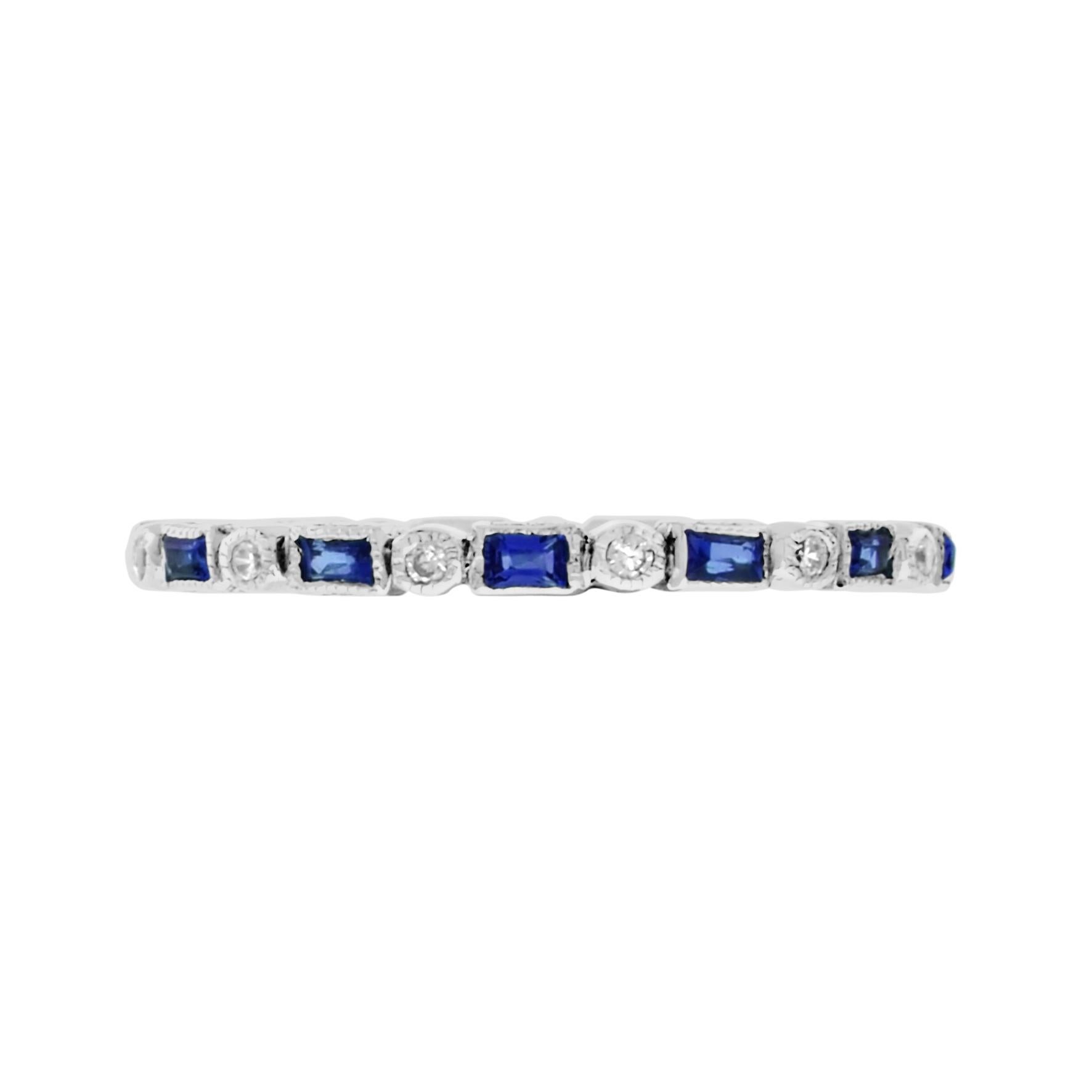 Inspired by the Art Deco period, this Aimée ring features 0.86 carats of alternate round brilliant cut diamonds and baguette sapphires, elegantly framed by a millgrain edge. This 14k gold band is the perfect alternative wedding or eternity ring. The