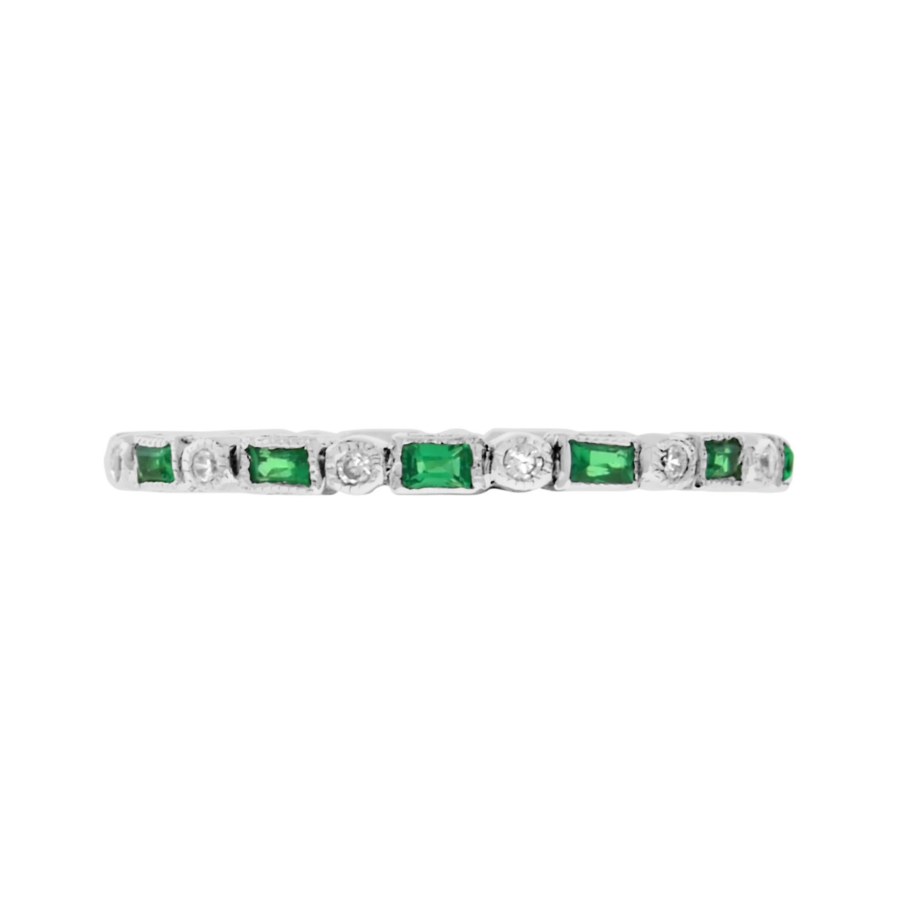Inspired by the Art Deco period, this Aimée ring features 0.86 carats of alternate round brilliant cut diamonds and baguette emeralds, elegantly framed by a millgrain edge. This 14k gold band is the perfect alternative wedding or eternity ring. The