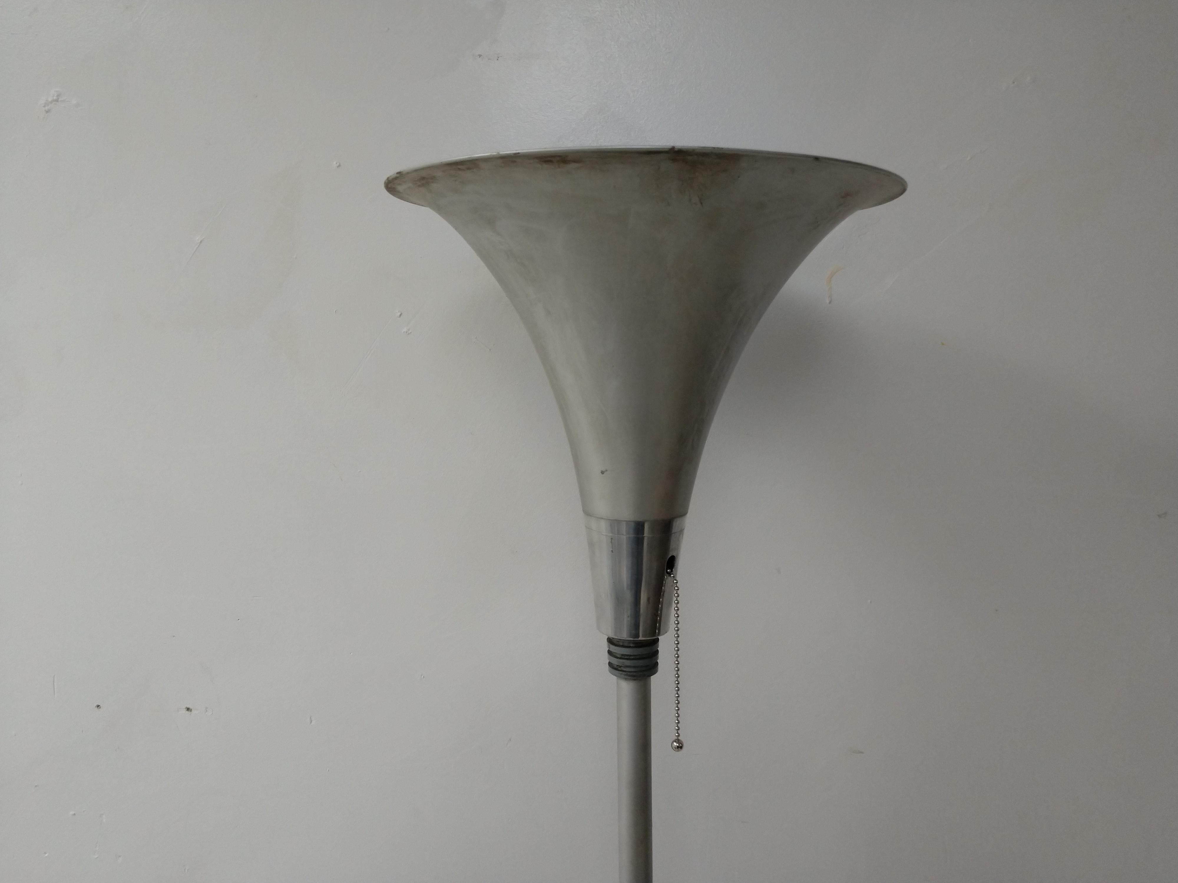 Simple and elegant aluminum with steel torchiere floor lamp from the Art Deco period.