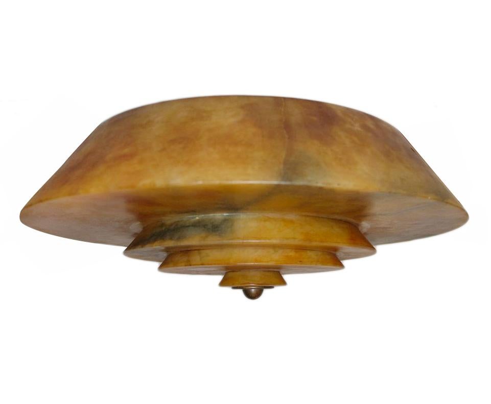 A circa 1930s French Art Deco alabaster light fixture with interior lights. Can be fitted as a pendant with central rod with variable drop.

Measurements:
Minimum drop 8