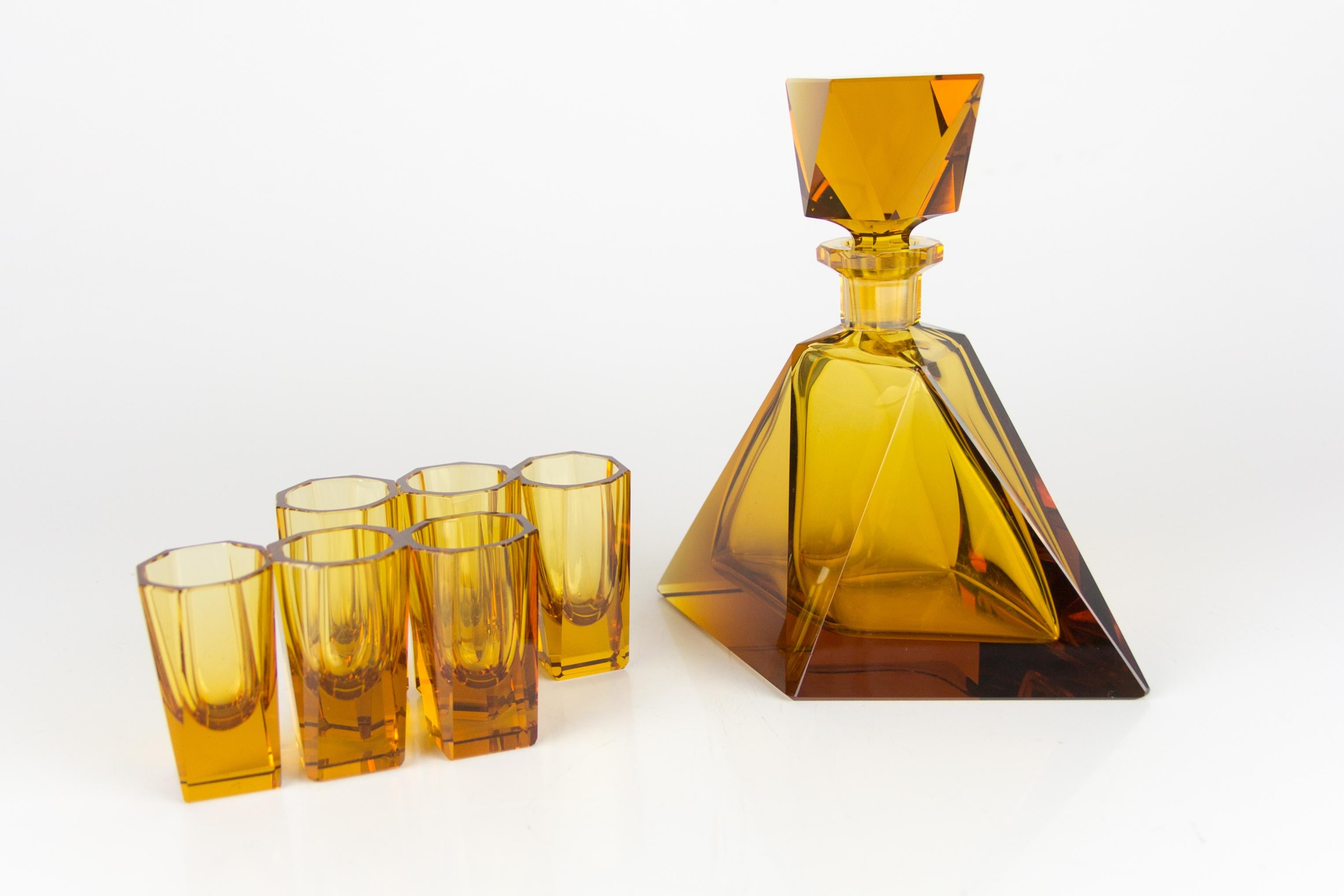 Beautifully colored, handmade Czech Bohemian glass decanter set with 6 glasses, made in the 1930s. The set is in a very nice orange-brown, amber color. As it is handmade, glasses have very small size differences - please see the photos - it can be