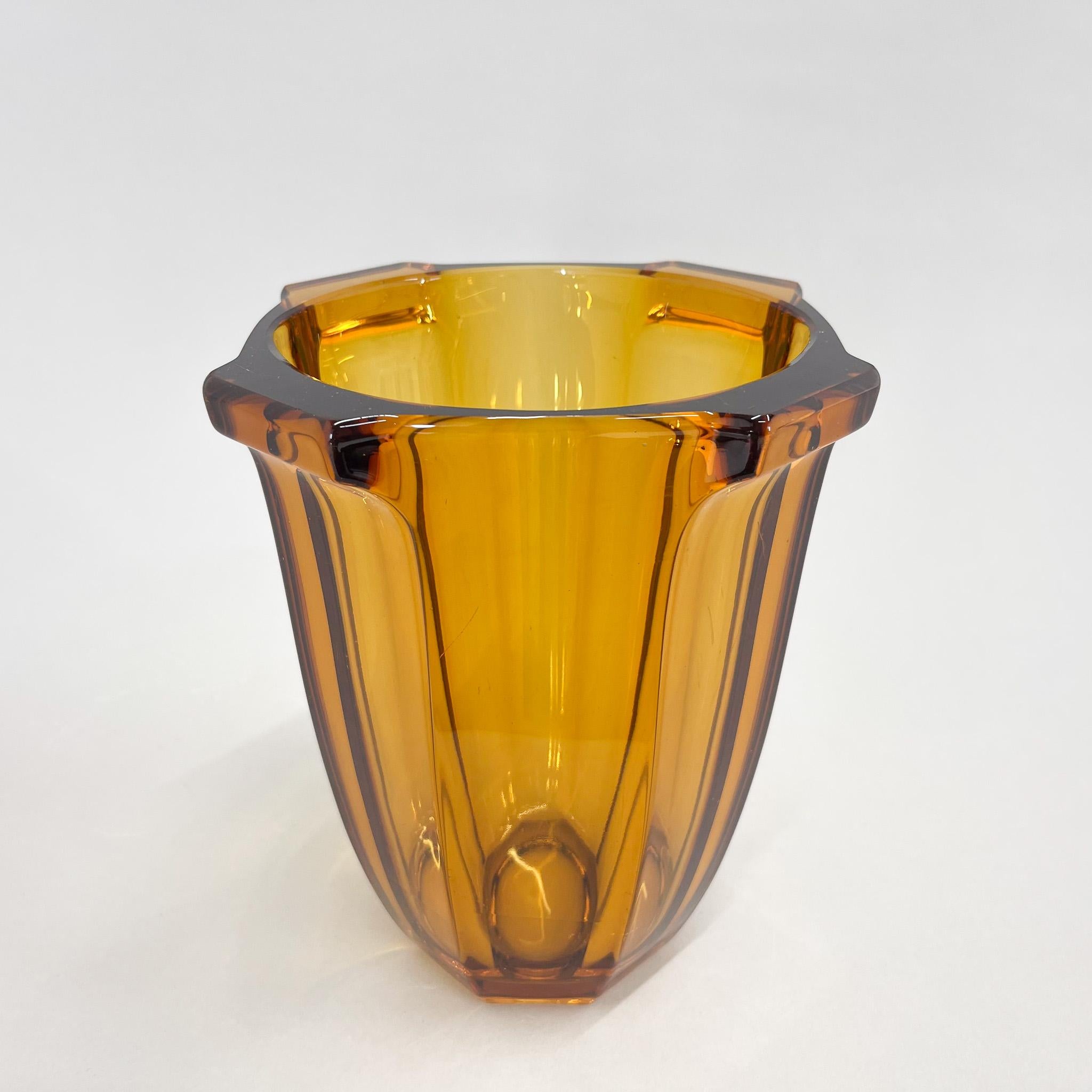 Art deco amber glass vase designed by Rudolf Schrotter in the 1930s. Produced by Rudolfova Hut Glassworks in former Czechoslovakia.