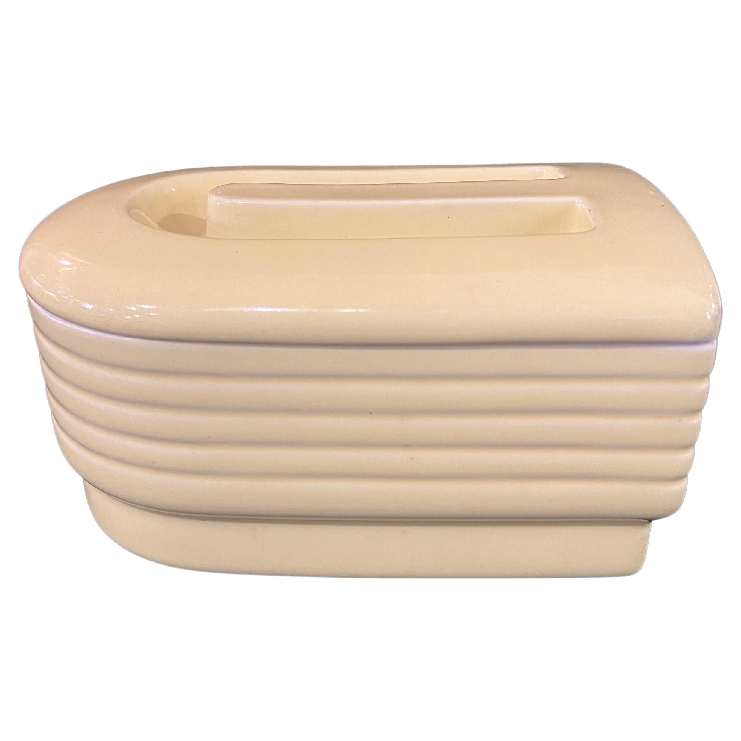 A beautiful example of American art deco design on this beautiful covered dish, excellent condition and beautiful yellow pastel color.