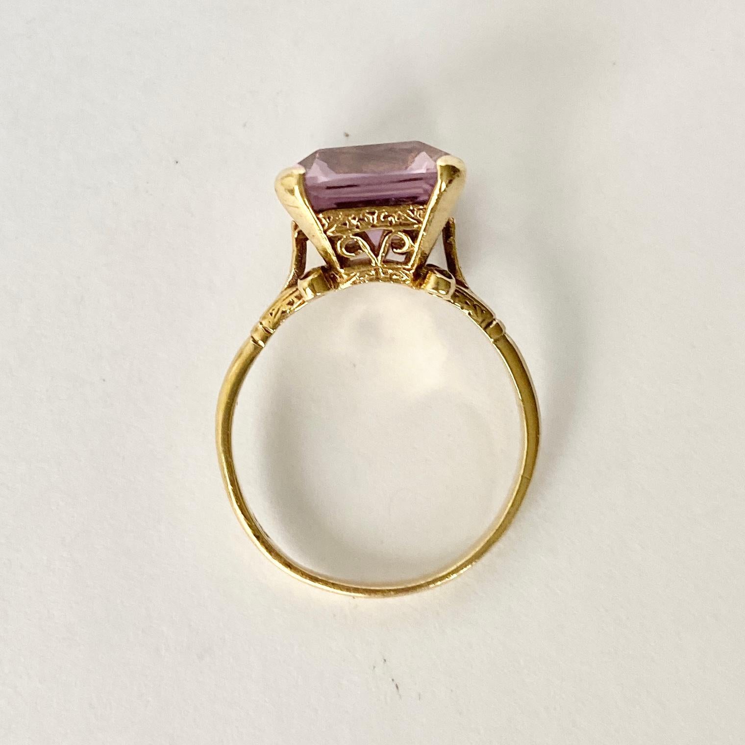 The amethyst set up high upon this ring is a gorgeous pale purple colour held in claws. Modelled in 9carat gold the gallery is ornate with engraving and open for details. 

Ring Size: T 1/2 or 9 /4 
Stone Dimensions: 14x12mm 
Height Off Finger: 9mm