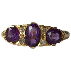 Art Deco Amethyst and Diamond 18 Carat Gold Three-Stone Ring