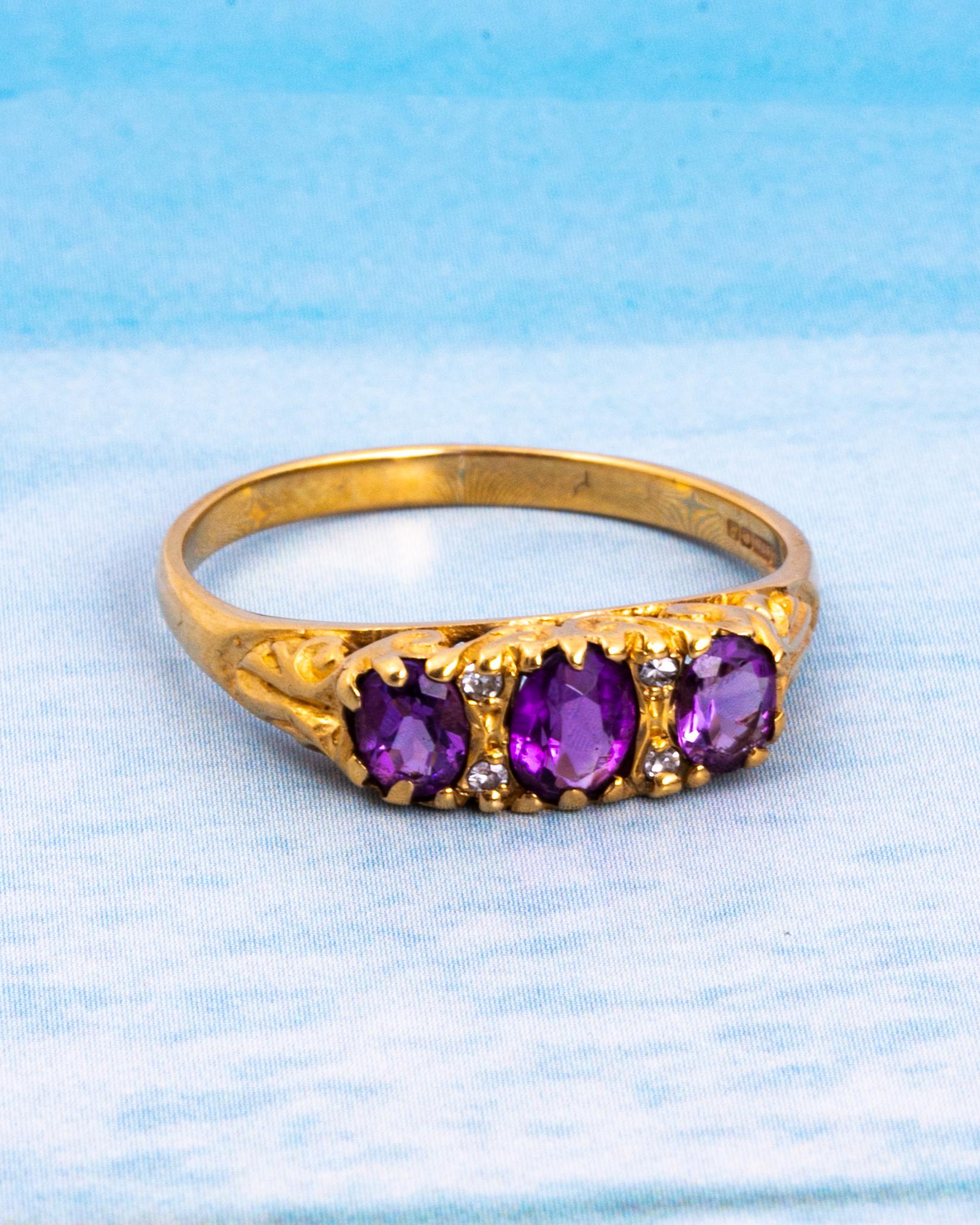 Women's or Men's Art Deco Amethyst and Diamond 9 Carat Gold Three-Stone Ring