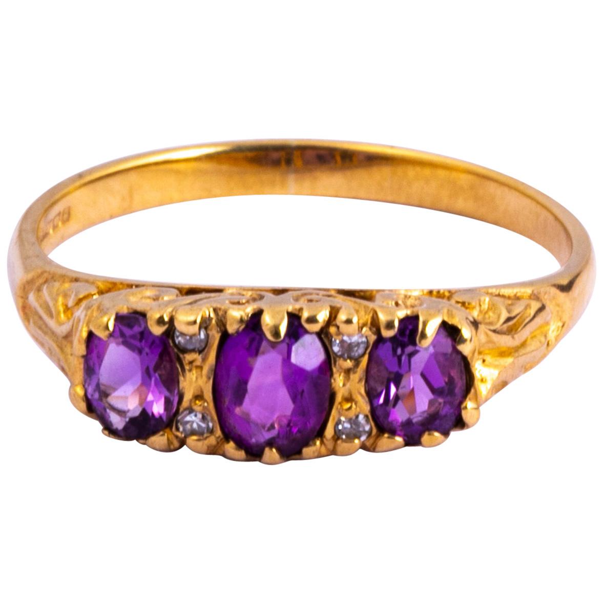 Art Deco Amethyst and Diamond 9 Carat Gold Three-Stone Ring