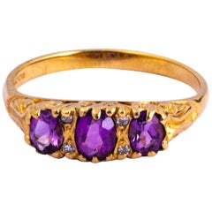 Art Deco Amethyst and Diamond 9 Carat Gold Three-Stone Ring