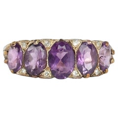 Antique Art deco Amethyst Five-Stone with Diamond Points Modelled in 18 Carat Gold