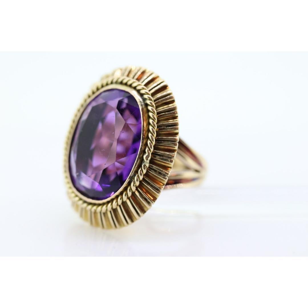 Vintage from the 1920s
Size: 6.5 US
Materials: Stone
Gemstone: Amethyst
Gem color: Purple
Band Color: Purple

Style: Art deco

Magnificent Vintage Cocktail ring from the 20s, maybe earlier.

Beautiful treasure.

14k Yellow Gold ring. Hand Made.