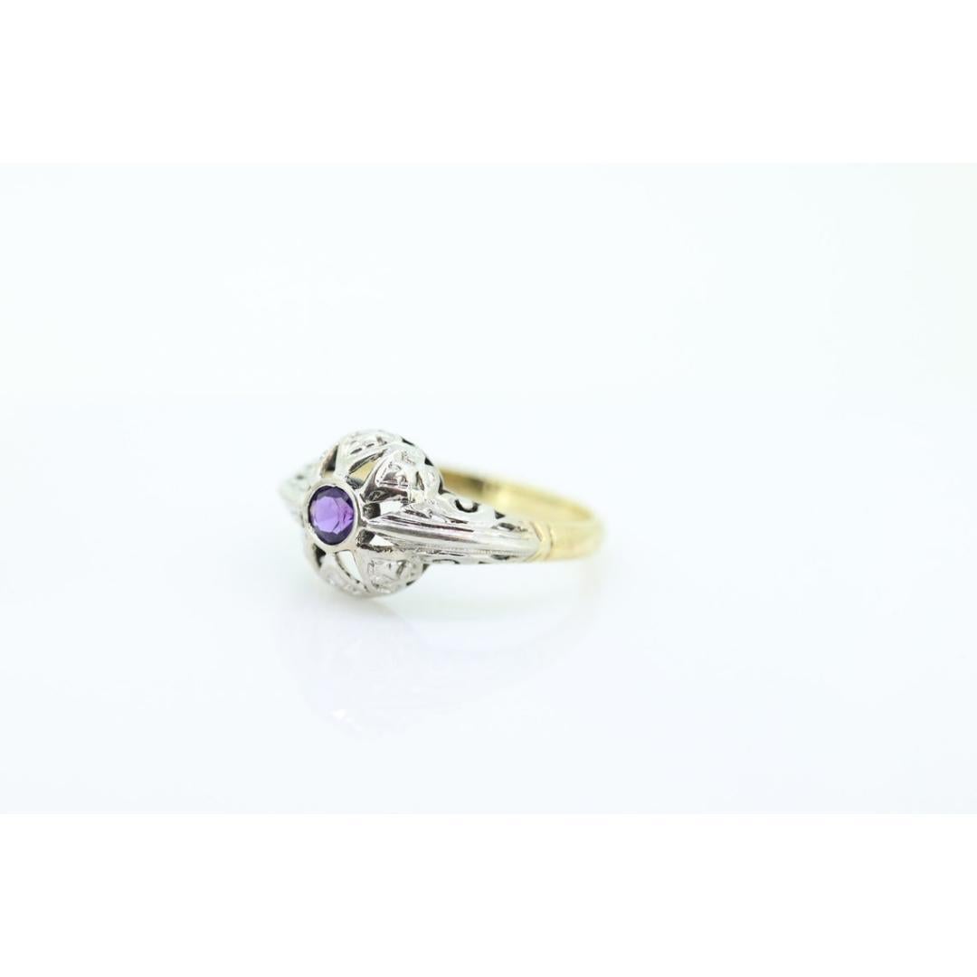 Vintage from the 1920s
Size: 8 3/4 US
Materials: Gold, Platinum, Rose gold, White gold
Gemstone: Amethyst
Gem color: Purple
Band color: White

Style: Art deco

Super unique vintage ring. Deep purple amethysts set into 18k white gold ring. The band