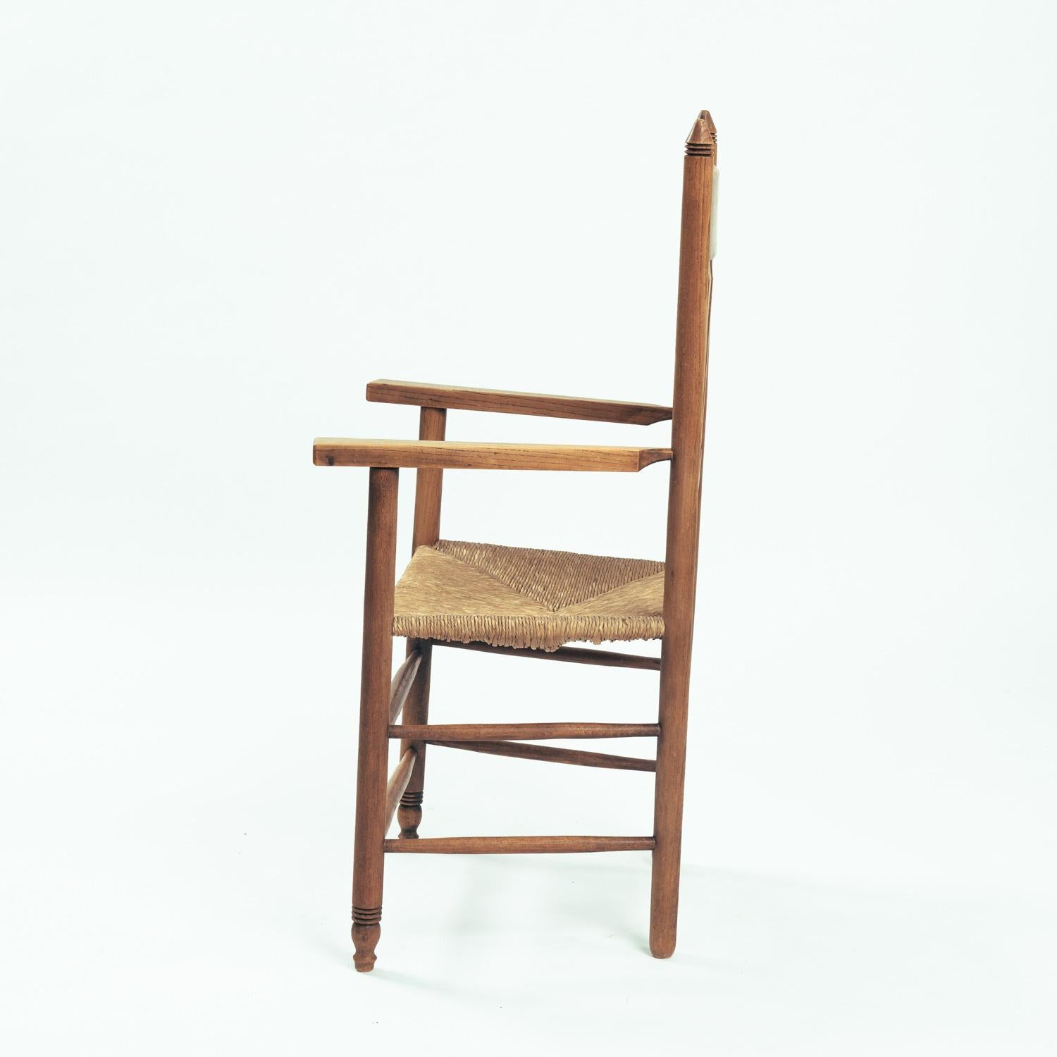 Straw Art Deco Amsterdam School armchair in oak with straw seat, The netherlands, 1930 For Sale
