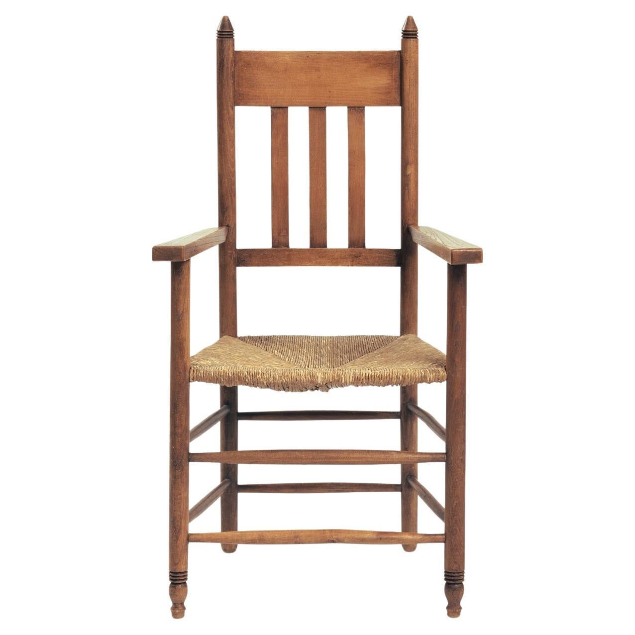 Art Deco Amsterdam School armchair in oak with straw seat, The netherlands, 1930