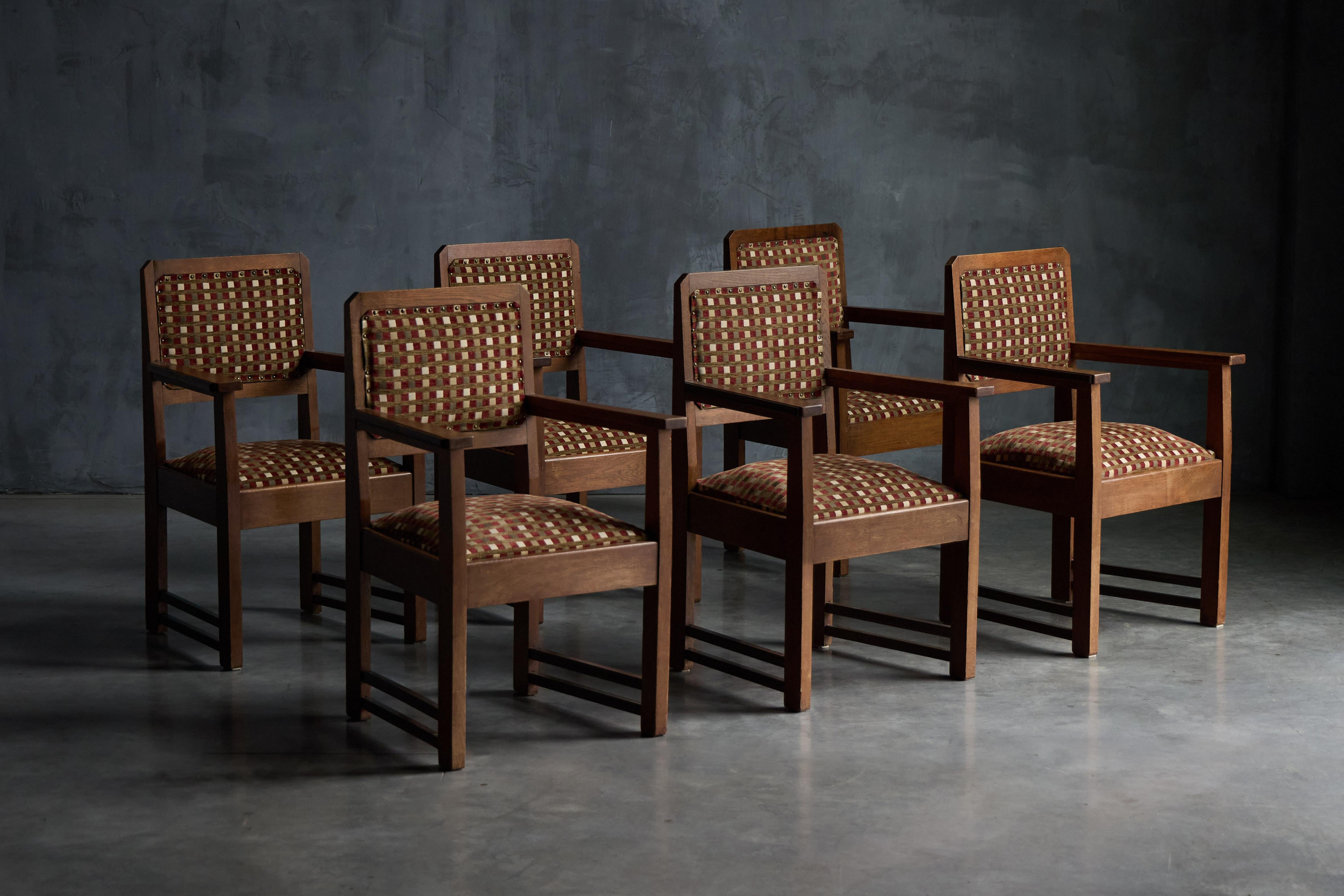 Dutch modern set of six chairs of Amsterdamse school. The original upholstery creates an authentic quality. The Amsterdam School is famous for its architecture, both in the Netherlands and internationally. However, the school’s spectacular designs