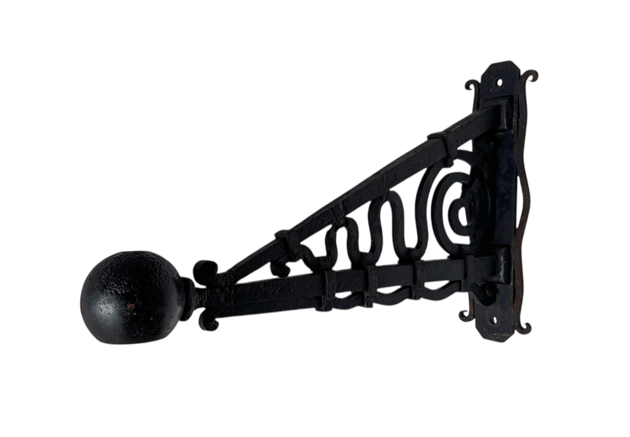 Magnificent and rare Art Deco Amsterdamse School wall mounted flagstaff or flagpole.
Striking Dutch design from the 1920s.
Original patinated wrought iron frame with opening.
This wonderful Art Deco Amsterdamse School wall mounted flagstaff or