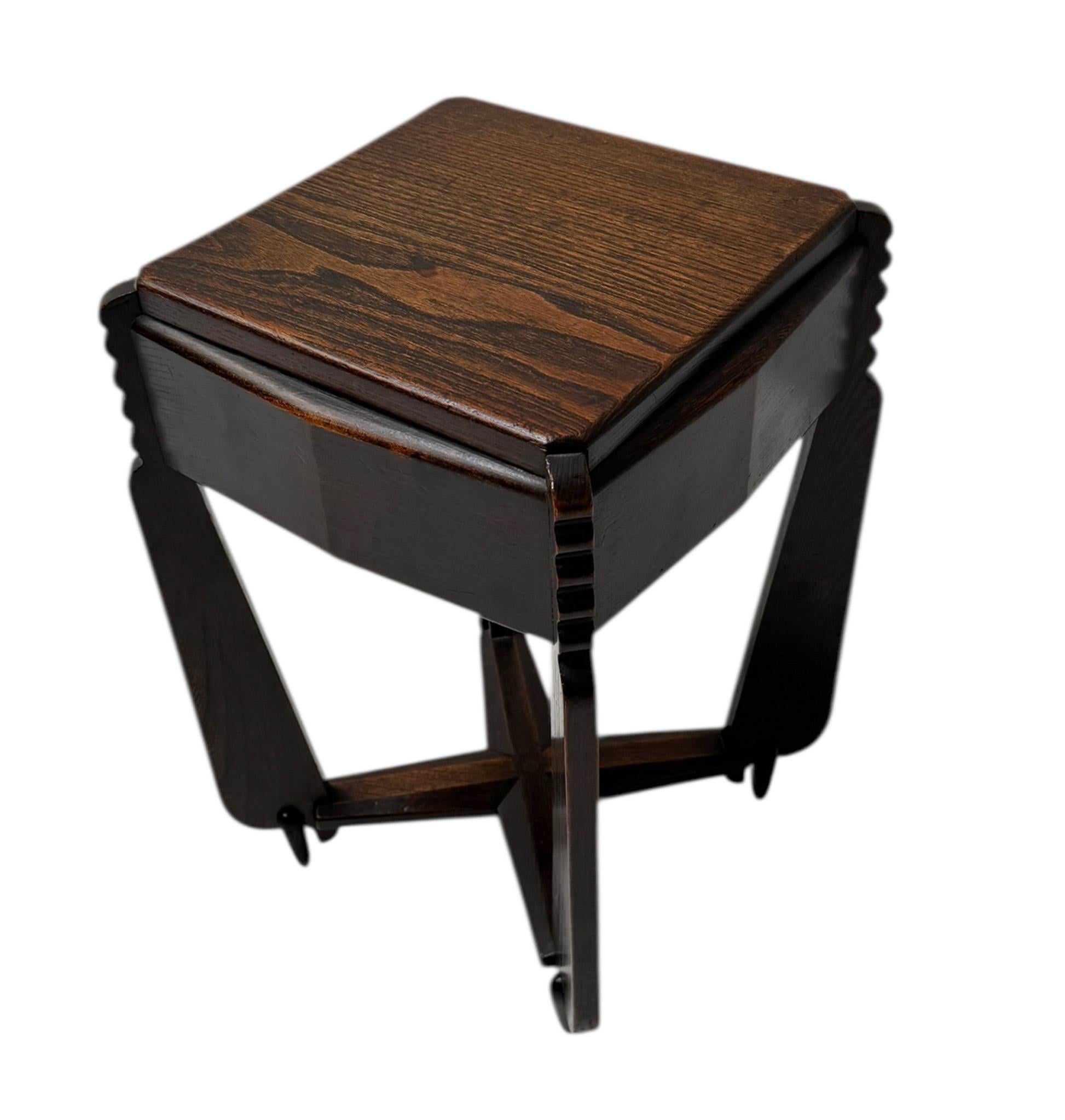 Magnificent and rare Art Deco Amsterdamse School side table.
Design by Architect Christiaan Bartels.
Striking Dutch design from the 1920s.
Solid  original stained elm base and top.
Original solid ebony feet.
Marked with original stamp.
This