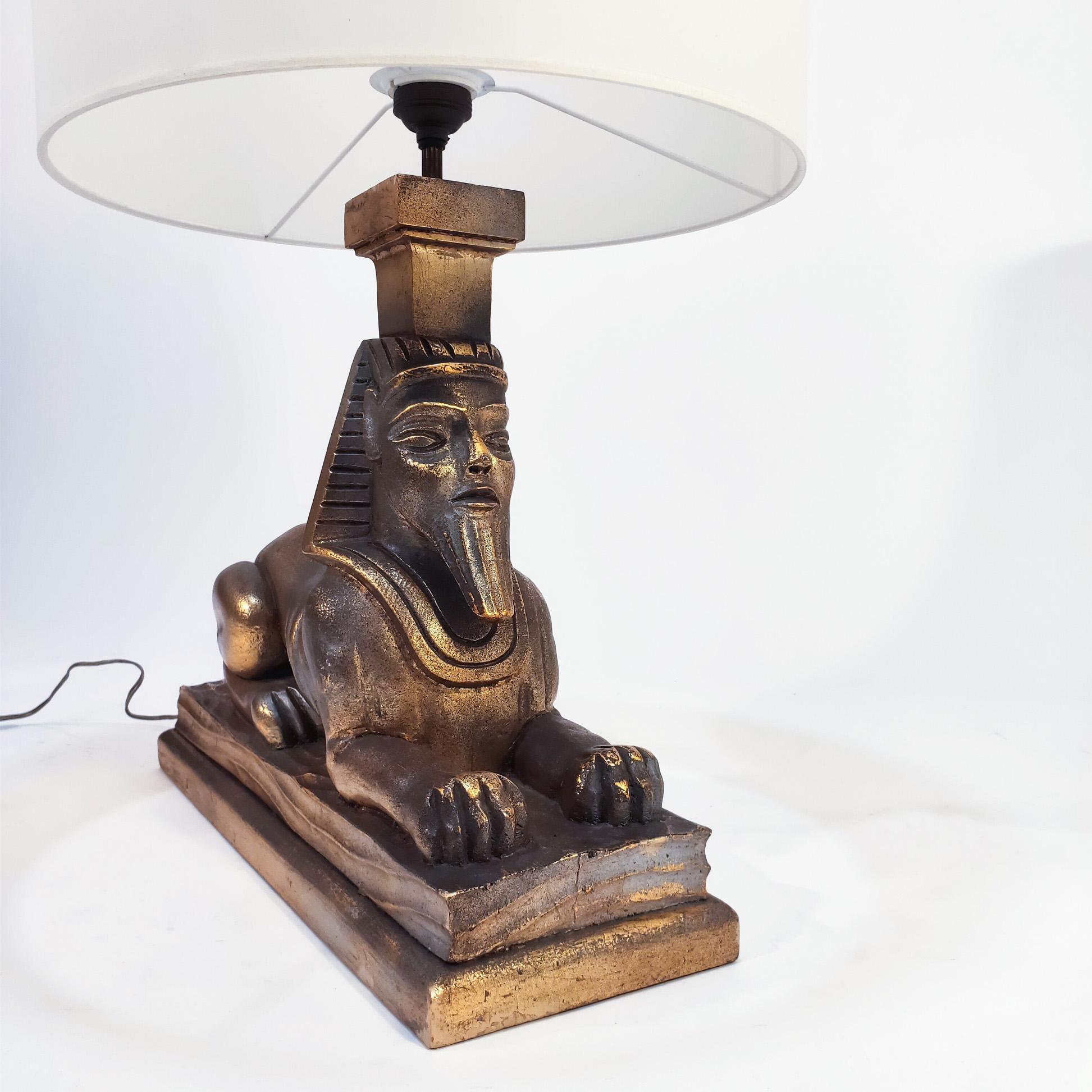 Metà XX secolo Art Deco and Egyptian style gilded table lamp, Spain, 1960s in vendita