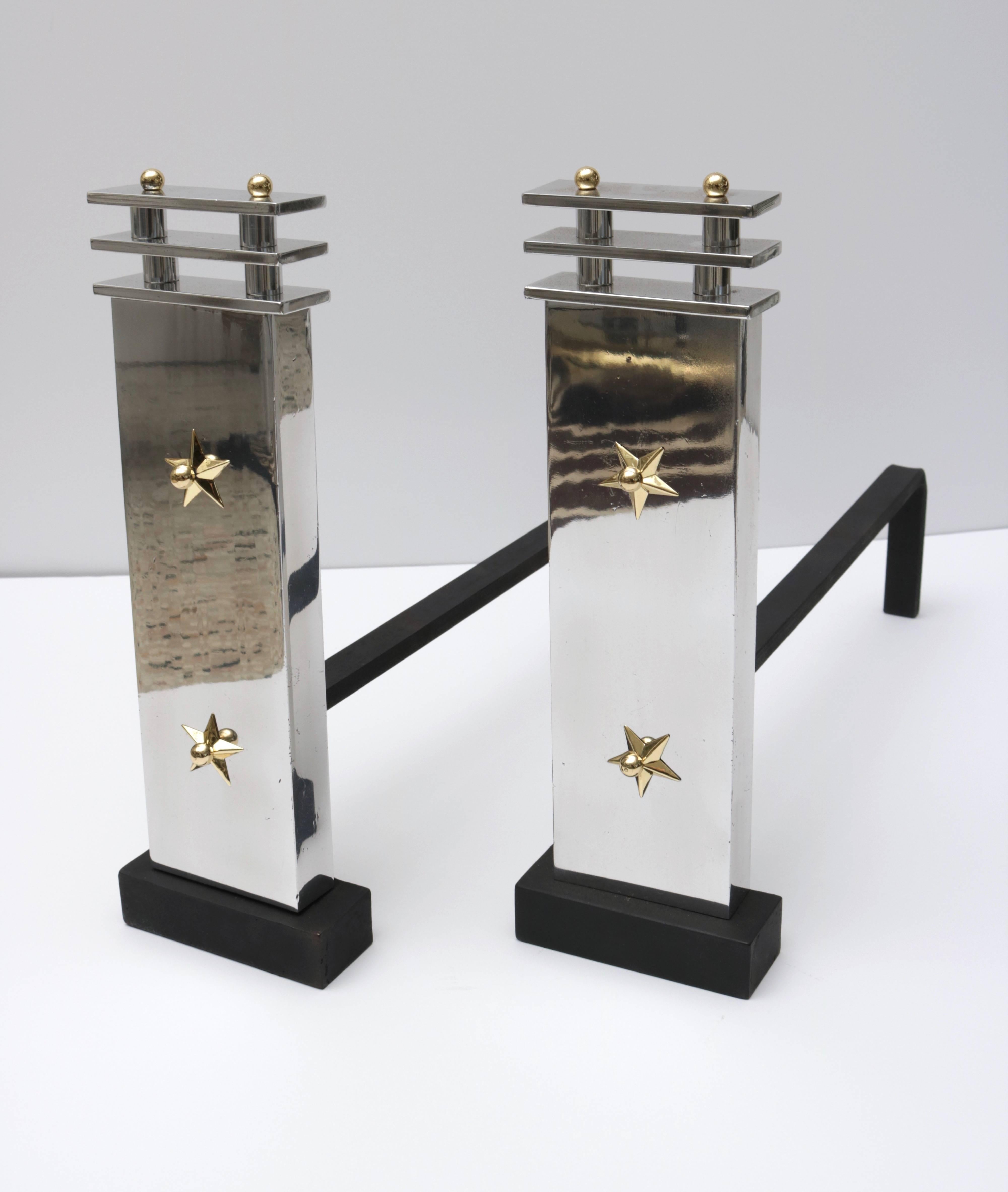 This stylish set of Art Deco style andirons date from the 1920s-1930s and are fabricated in aluminum, brass and wrought iron. 

Note: They have been professionally polished and are ready to set the tone for your fireplace.

 
