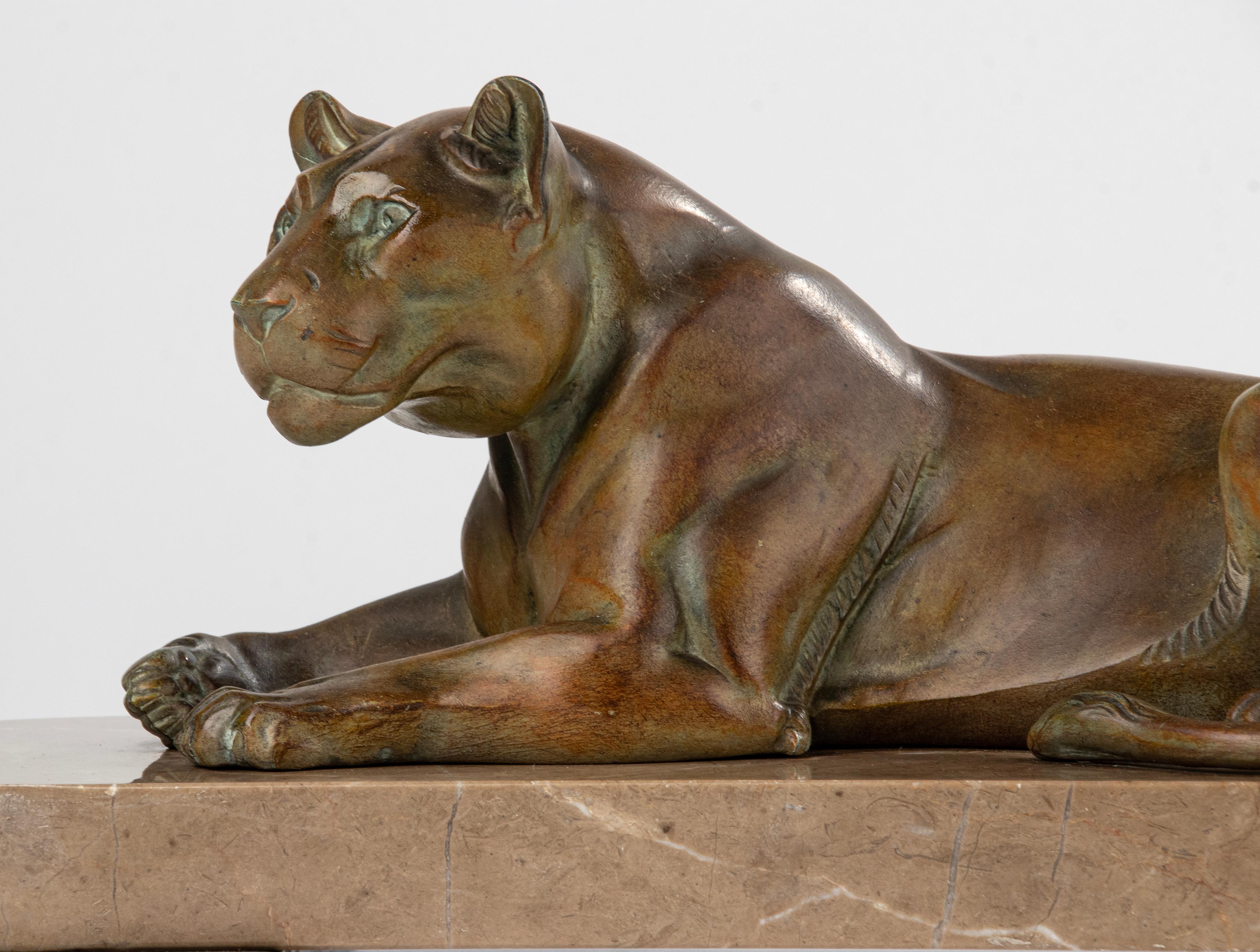 Art Deco Animal Sculpture of a Lioness Made of Spelter and Marble 2