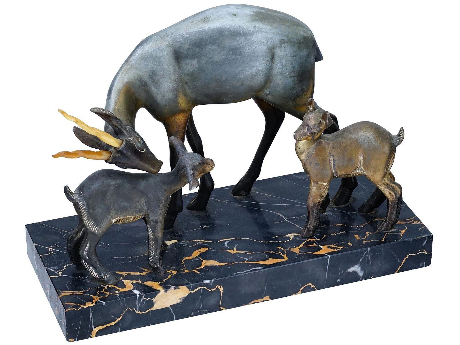 Finely sculpted and cast antique (early 20th century) Art Deco period bronze depicting antelope and her two calves, mounted on a rectangular Italian Portoro marble plinth.  Apparently unsigned.