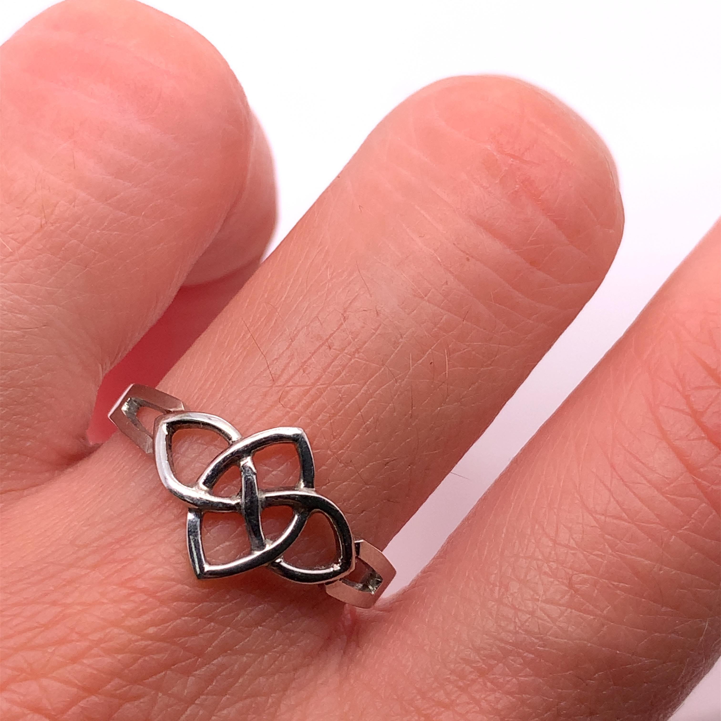 This beautiful ring is a perfect choice for those who are looking for a unique and elegant engagement ring. Crafted with the finest platinum, this chunky Celtic Solitaire ring is a handmade piece that is sure to impress. The ring features a snake