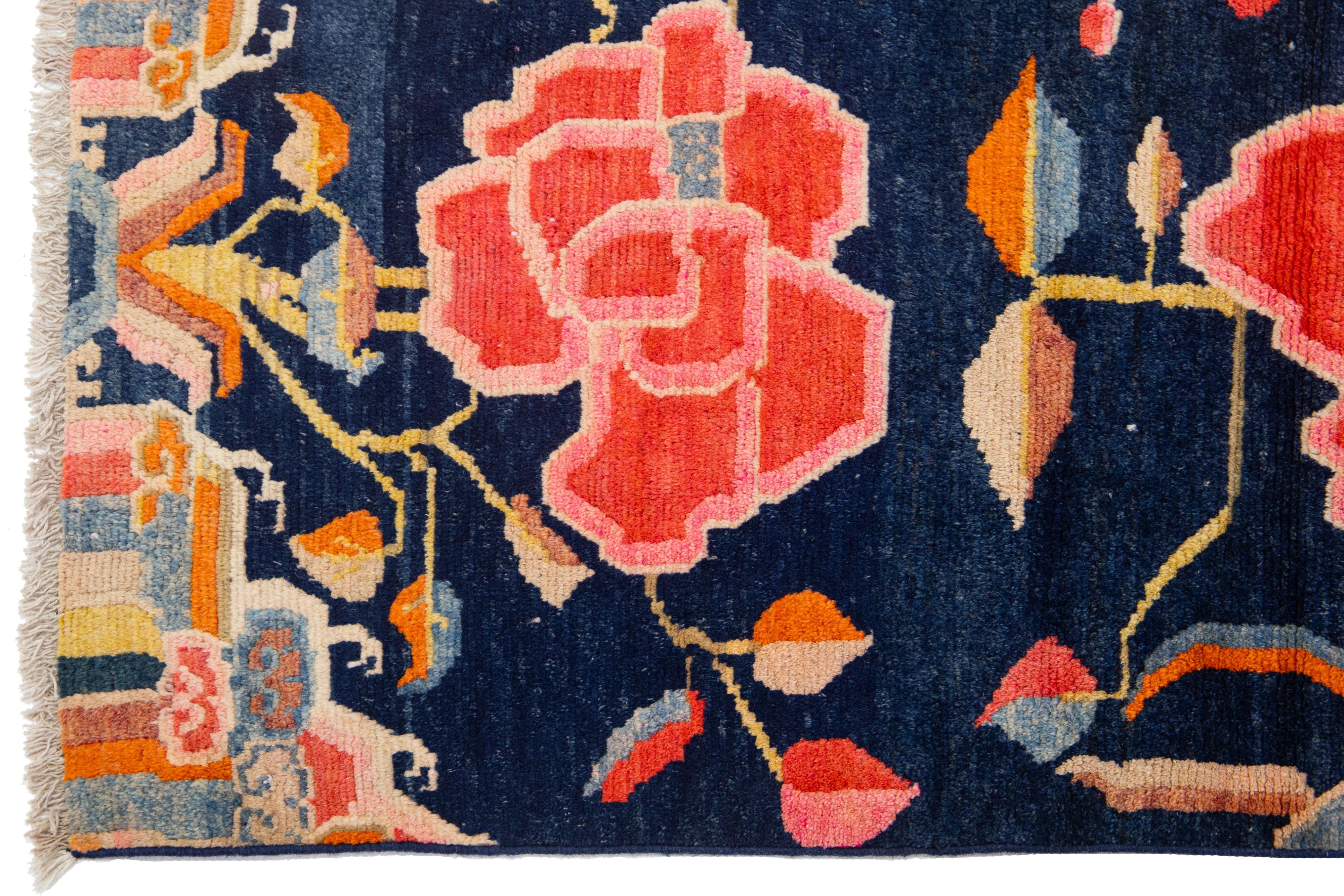 20th Century Art Deco Antique Chinese Wool Rug In Navy Blue with Floral Motif For Sale