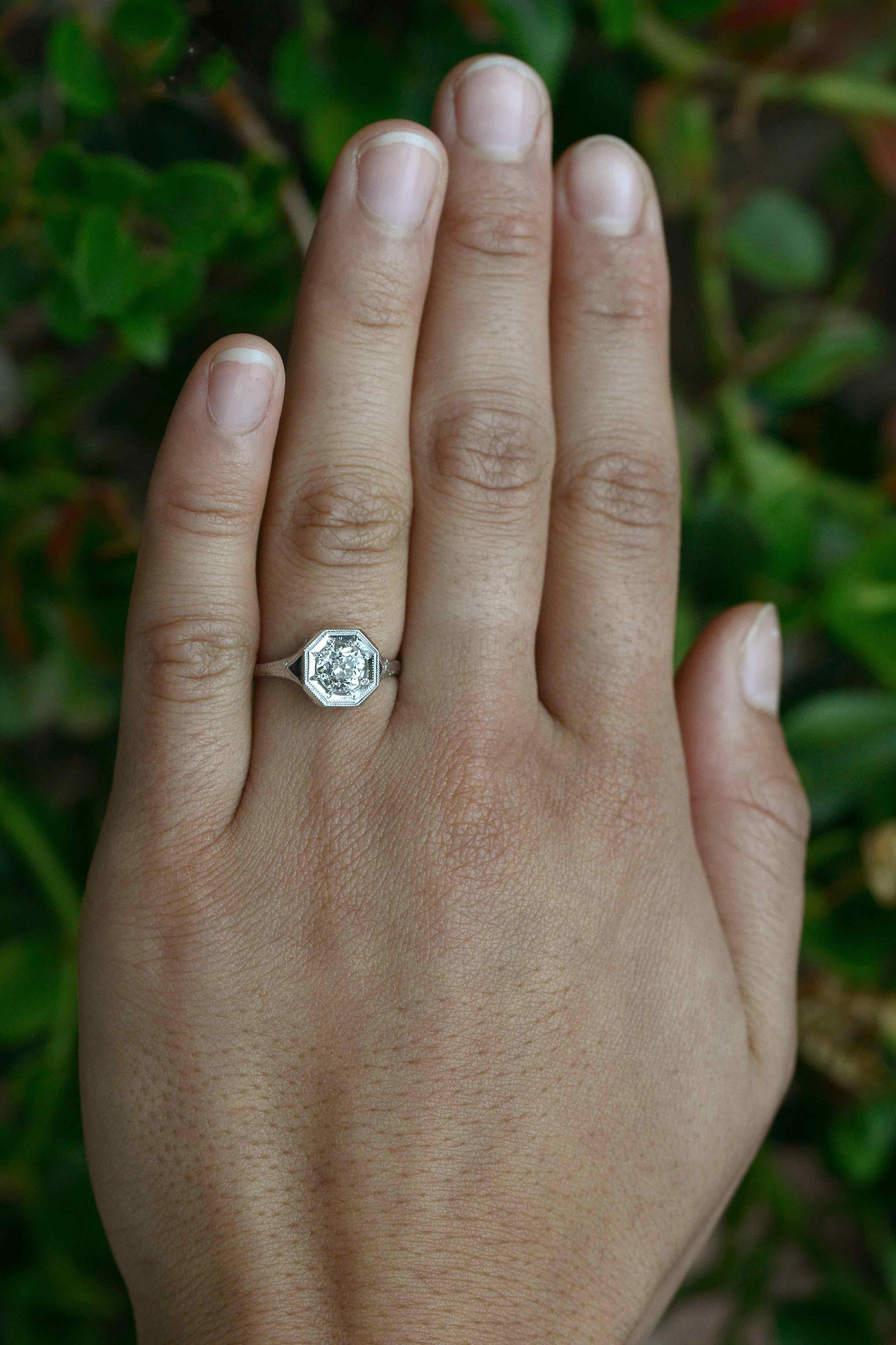 The Montecito antique engagement ring. The captivating and sleek geometric lines of this original antique Art Deco diamond engagement ring are just the beginning of the story. Centered by a chunky fireball shooting sparkles everywhere, the old