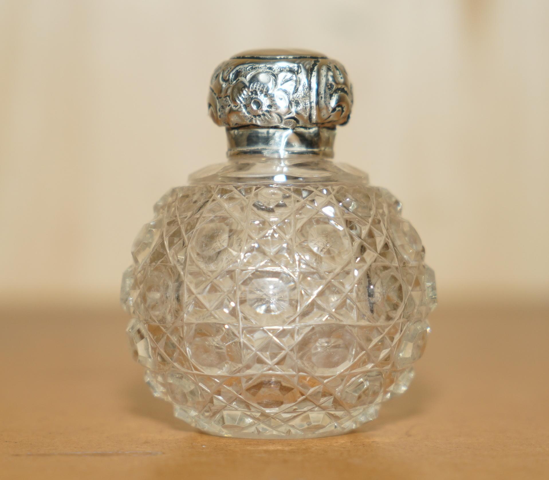 Royal House Antiques

Royal House Antiques is delighted to offer for sale this medium sized Art Deco Antique cut glass Crystal Perfume bottle flask with sterling silver cap 

A very good looking well made and decorative piece, the main body is