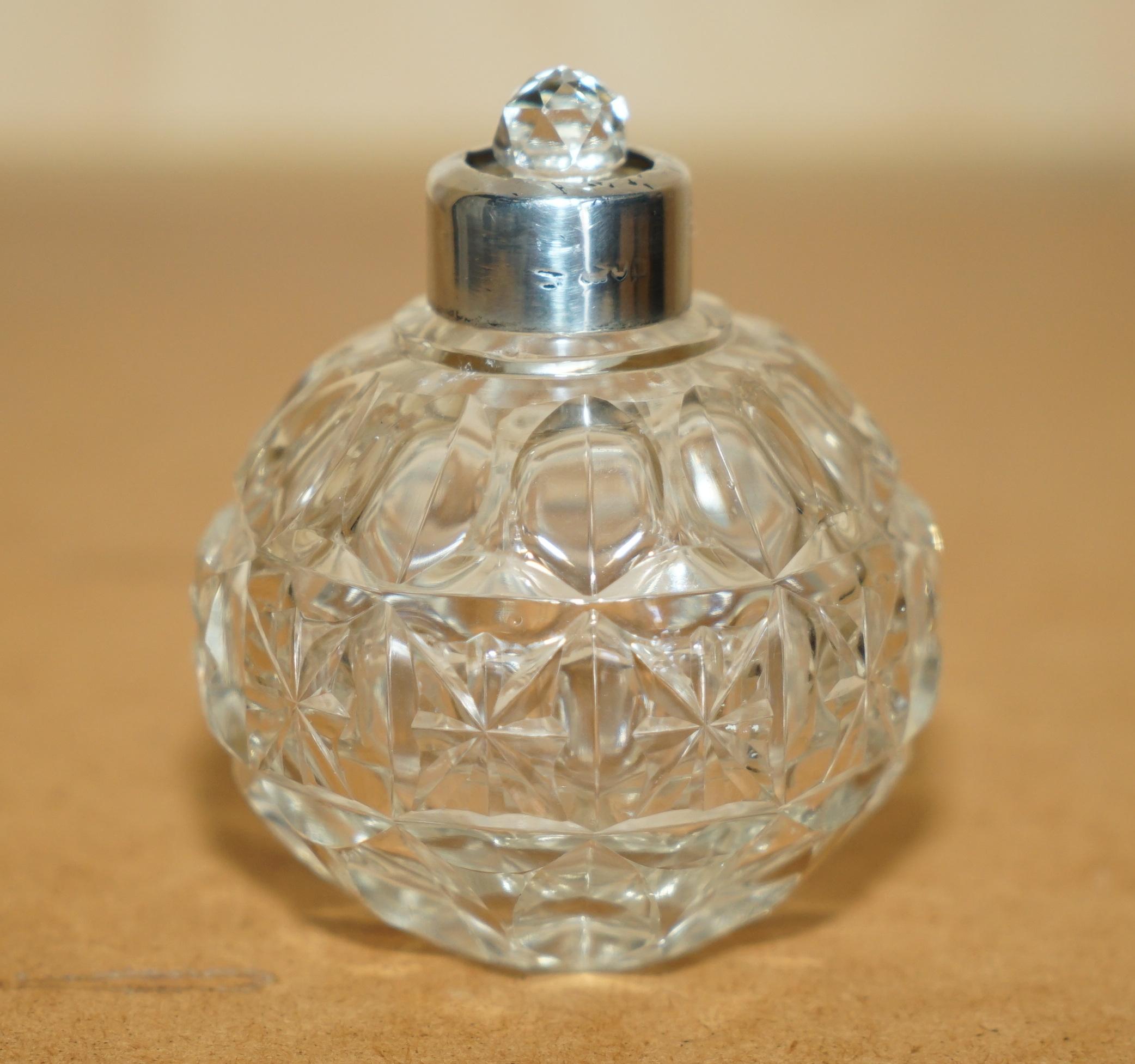 Royal House Antiques

Royal House Antiques is delighted to offer for sale this medium sized Art Deco Antique cut glass Crystal Perfume bottle flask with sterling silver cap 

A very good looking well made and decorative piece, the main body is