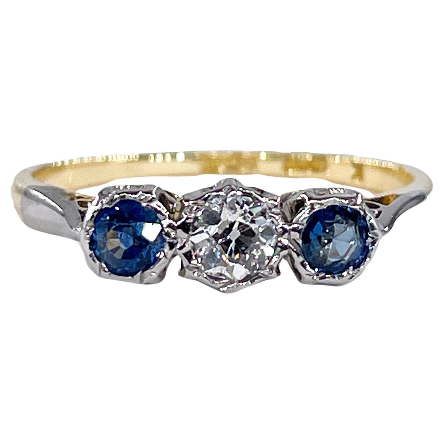 Art Deco Antique Three Stone Sapphire and Diamond Platinum 18K Yellow Gold Ring For Sale