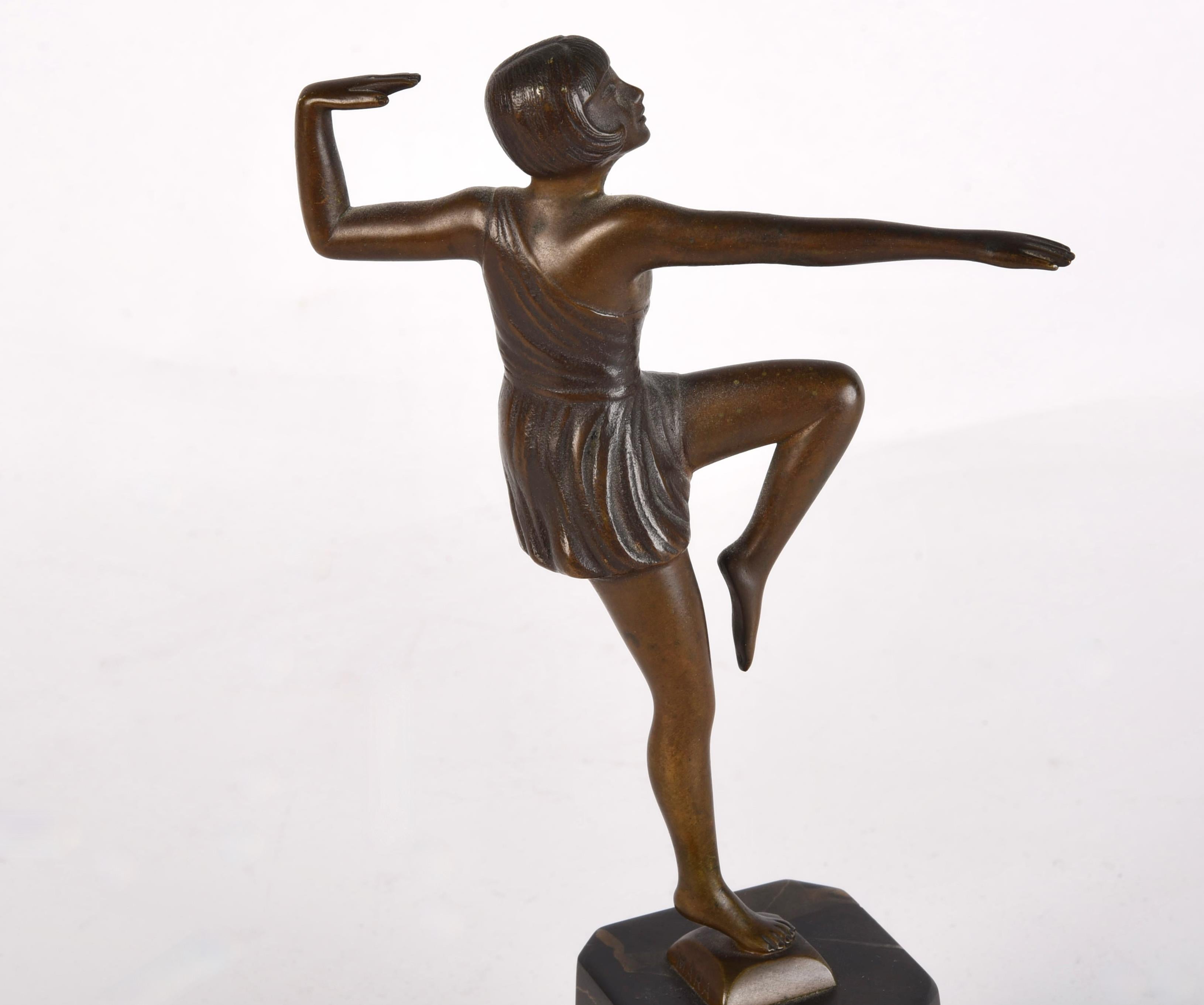 Signed MARA by Antonin Mara.  

Bronze sculpture atop marble base.  