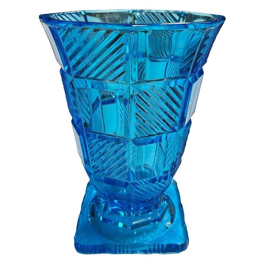 Original Art Deco Aqua Blue Glass Checkered Pedestal Vase features a striking checkered pattern and a vibrant aqua blue hue. Its pedestal base adds elegance, making it a perfect centerpiece or decorative accent. A timeless piece that blends retro