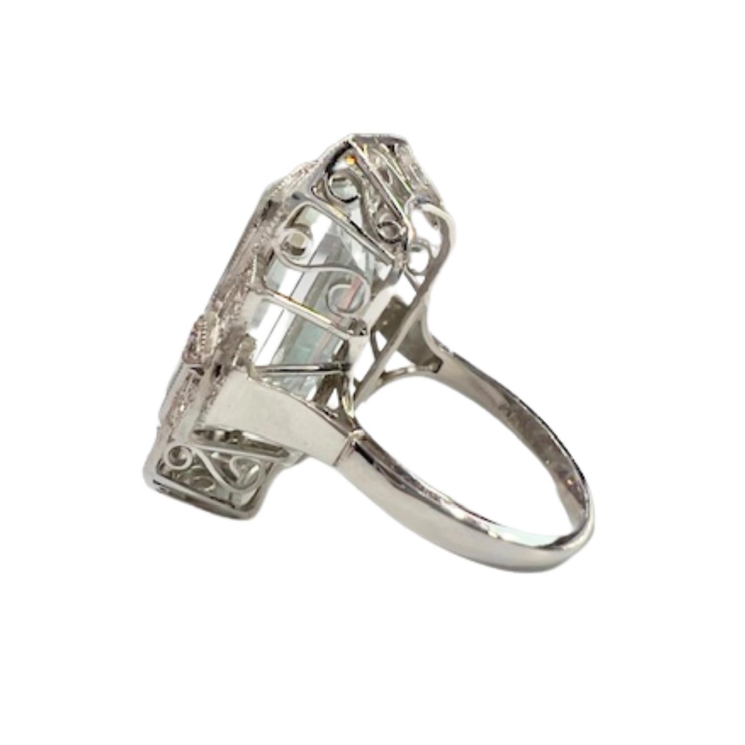 Emerald Cut Art Deco Aquamarine and Diamond Platinum Ring For Sale
