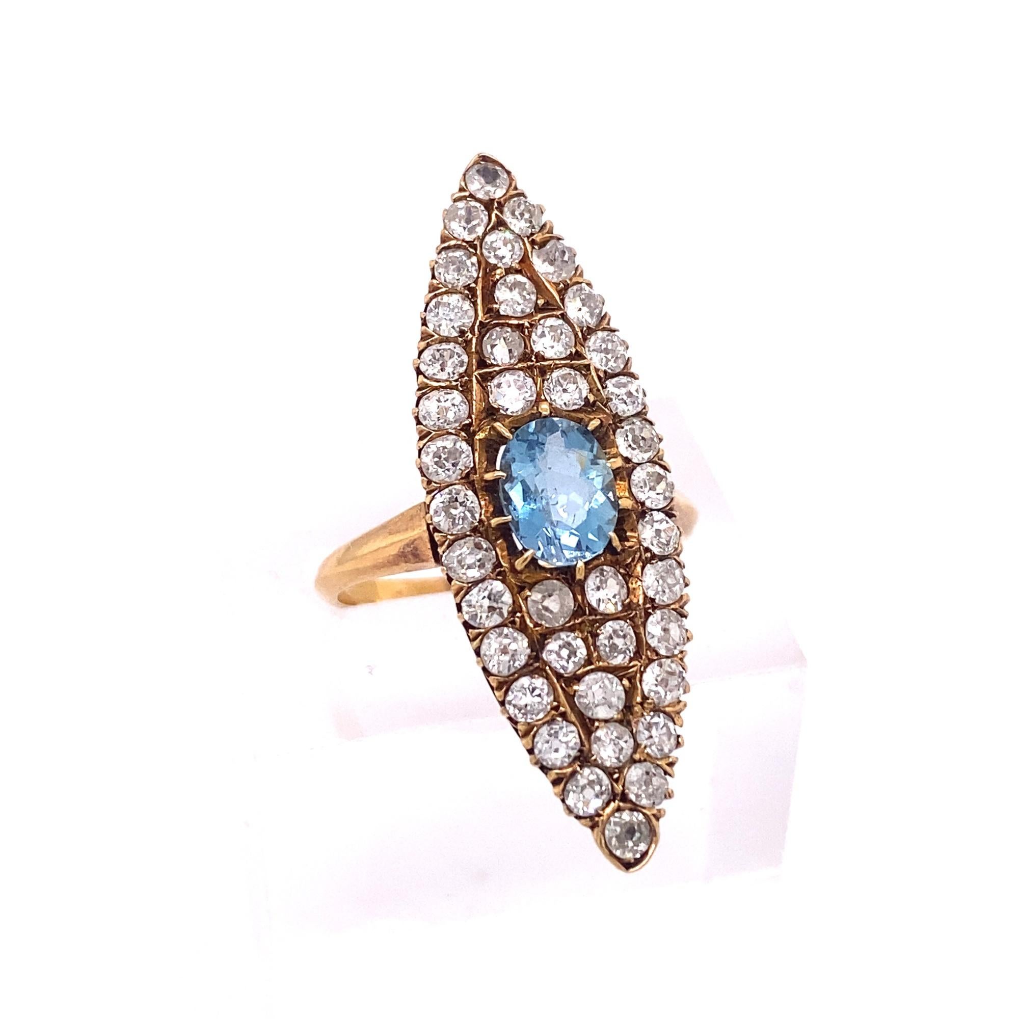 This is a beautiful original art deco ring set with old mien cut diamonds and an oval shape aquamarine. The aquamarine has amazing deep blue color and clarity it measures 7mm by 6mm. There are 40 round old mine cut diamonds they average H-I Color