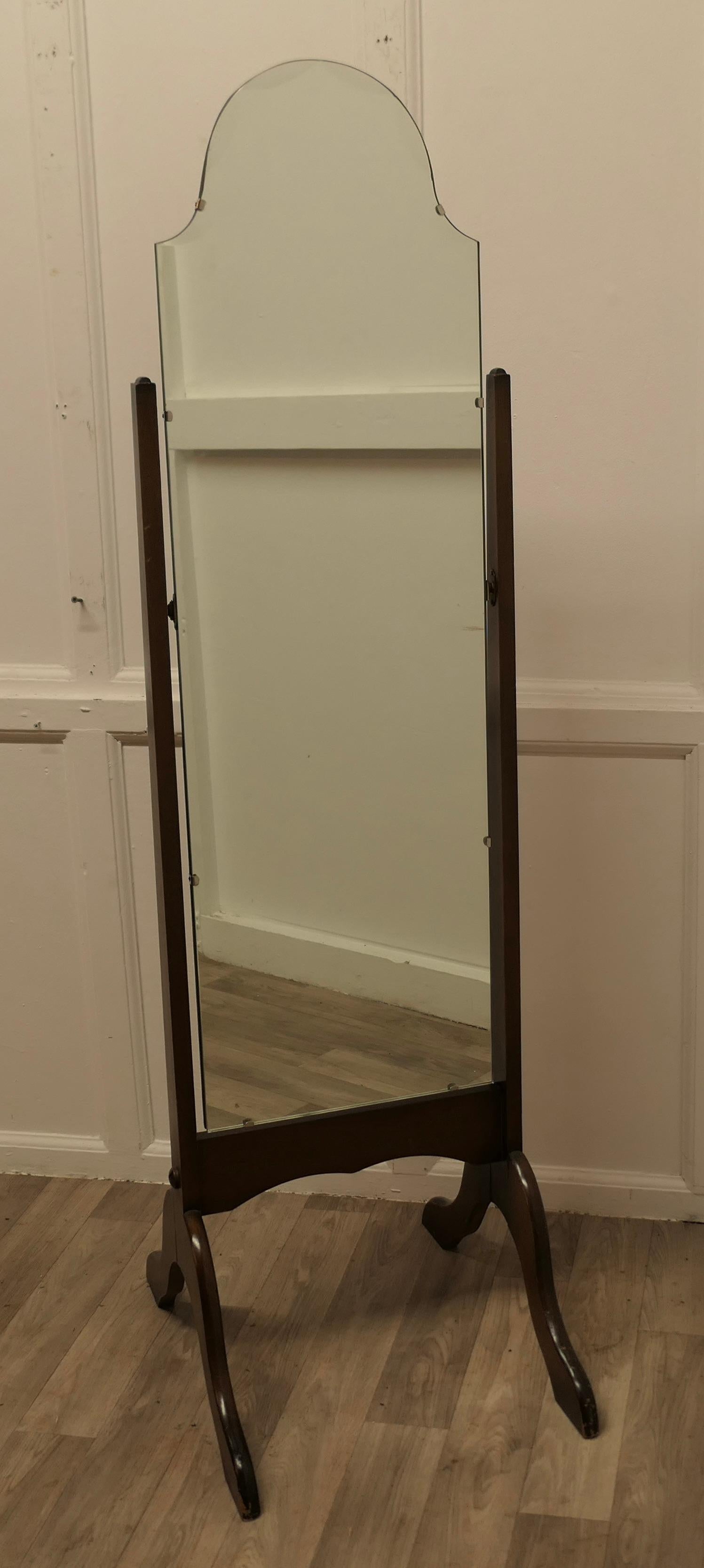 Art Deco Arch Top Cheval Mirror

The Mirror has an Arch shaped top which has a bevelled scallop to the glass, it sits firmly in its stand and swivels for maximum advantage
The Stand is set on arching splayed feet, the mirror is in used good