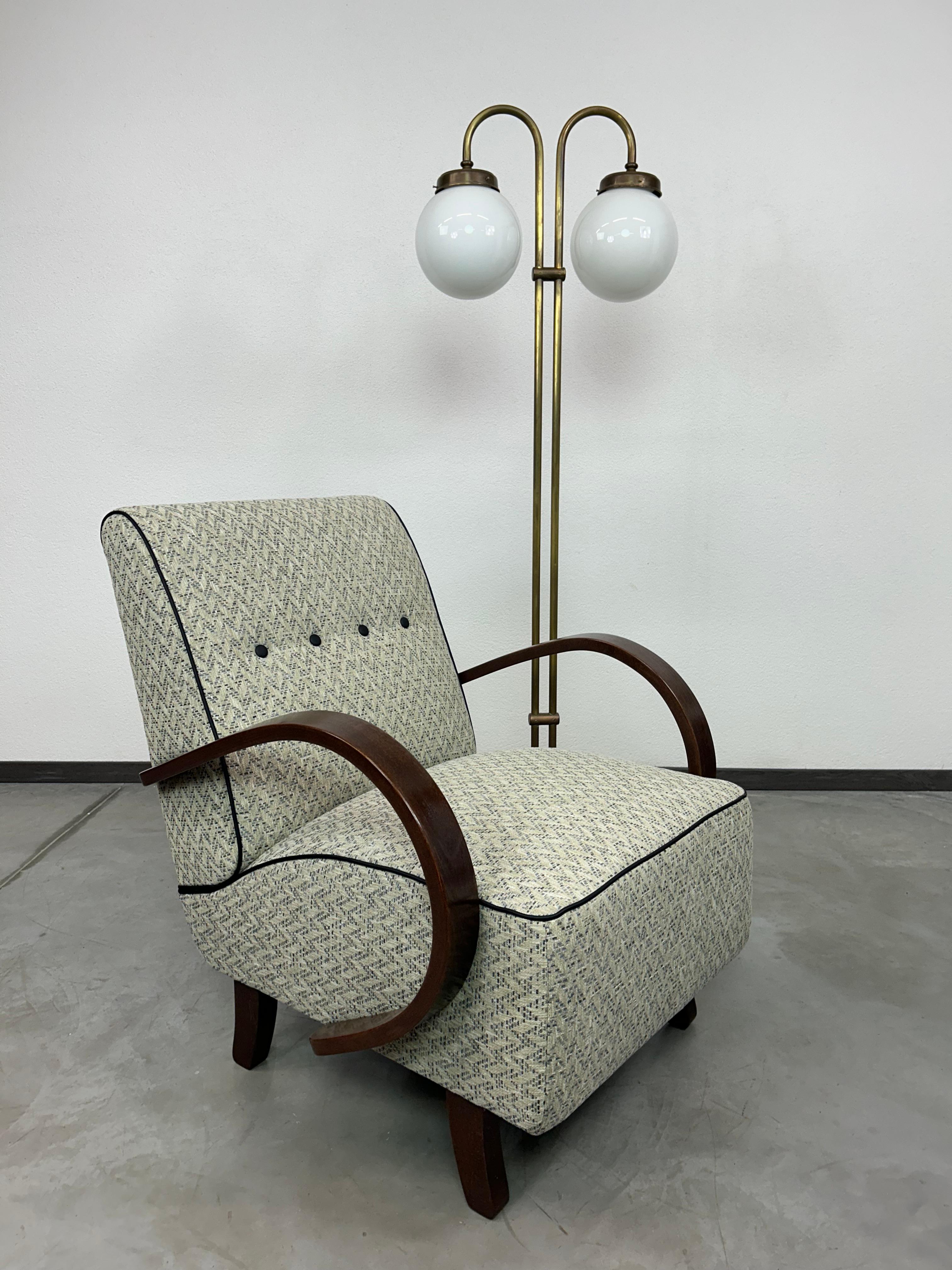 Art deco armchair by Jindřich Halabala. Professionally stained and repolished.