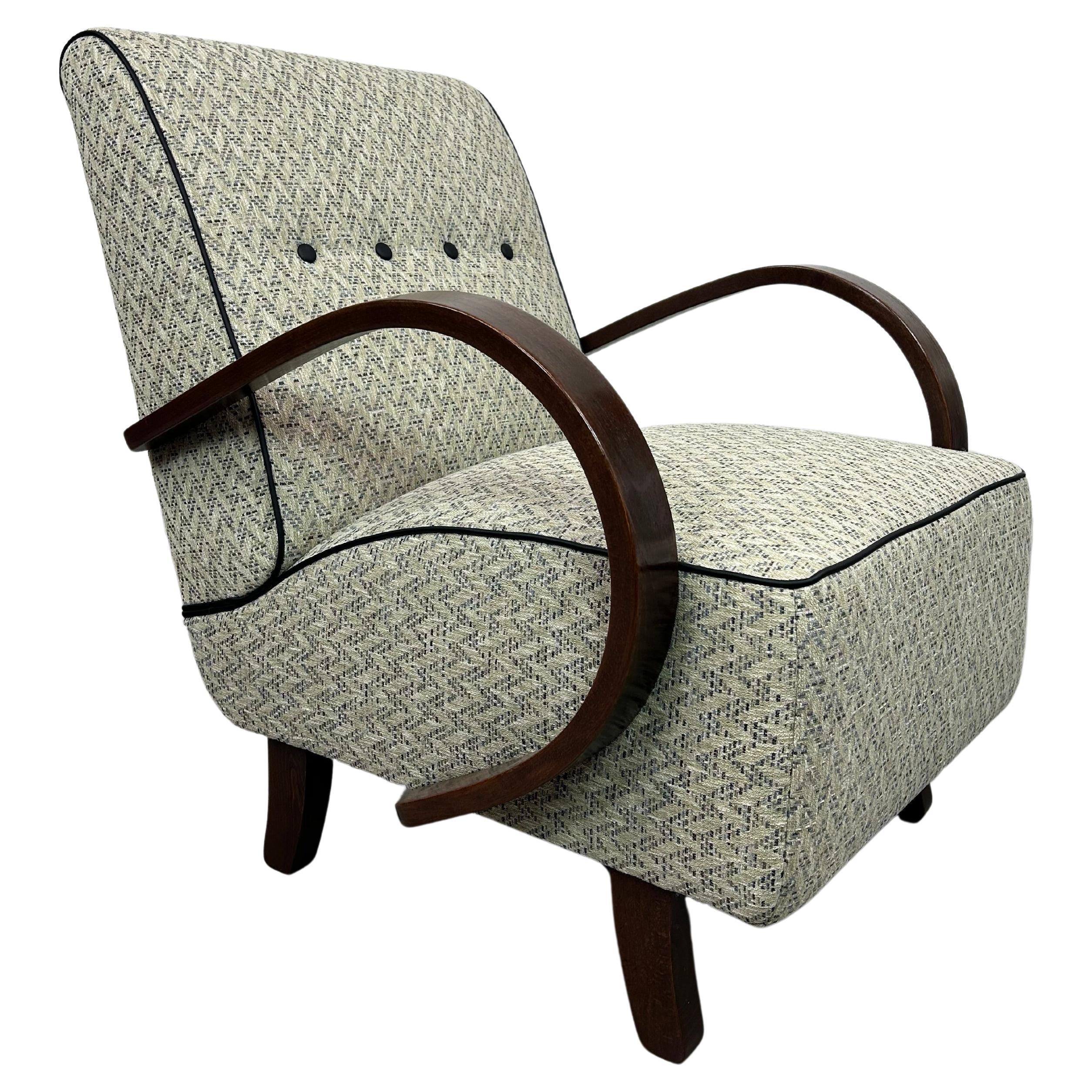 Art deco armchair by Jindřich Halabala For Sale