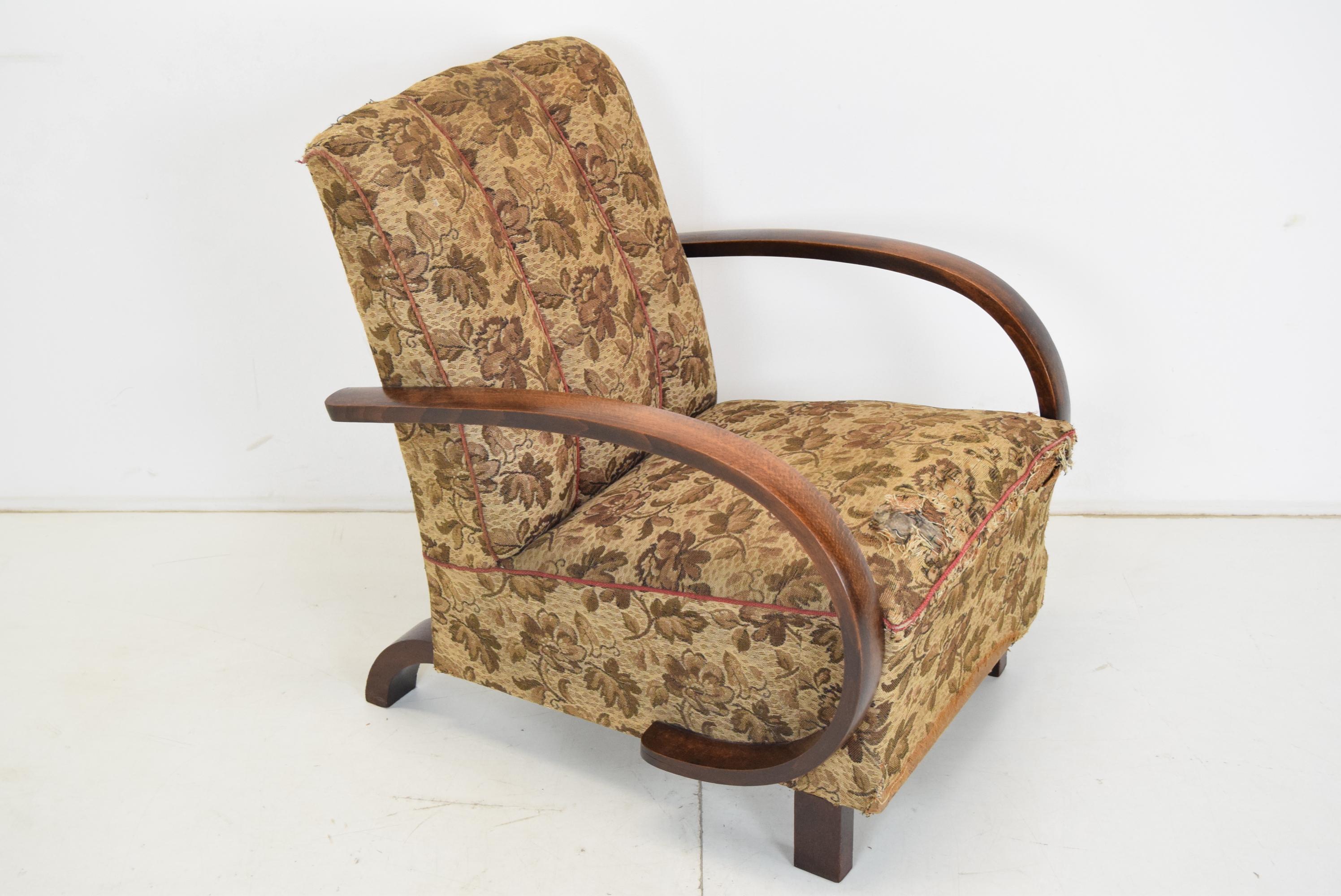 Made of wood, fabric.
The chair needs to be reupholstered.
Wood is good condition.
Original condition.
Rare piece.