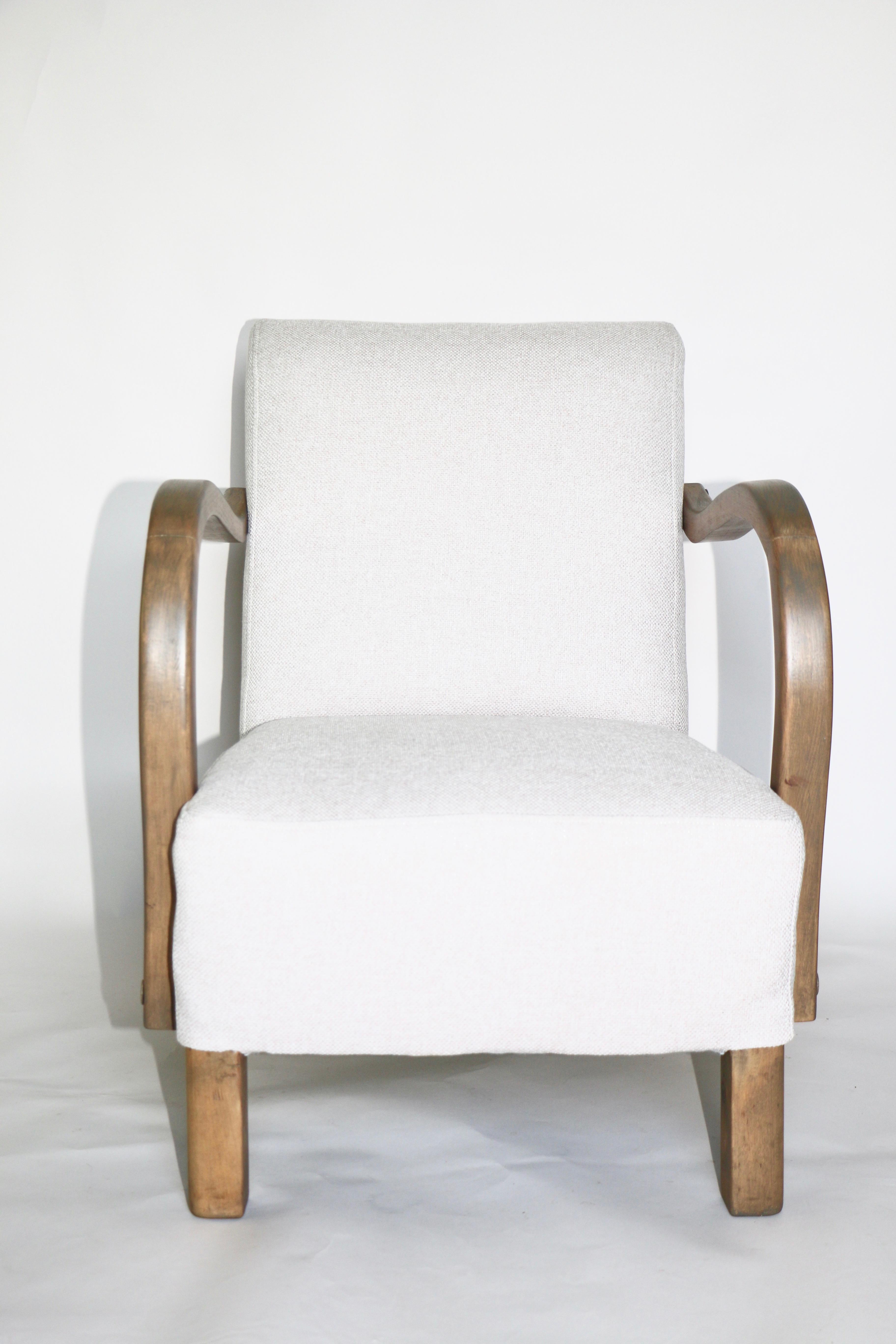 Restored Art Deco armchair in beige from 1960s, new upholstery covered with structural fabric in fashionable beige color, finished with wooden chair cushion. Wooden elements in grey wood wax color. Good condition.

Dimension: H 82 x W 64 x D 75.