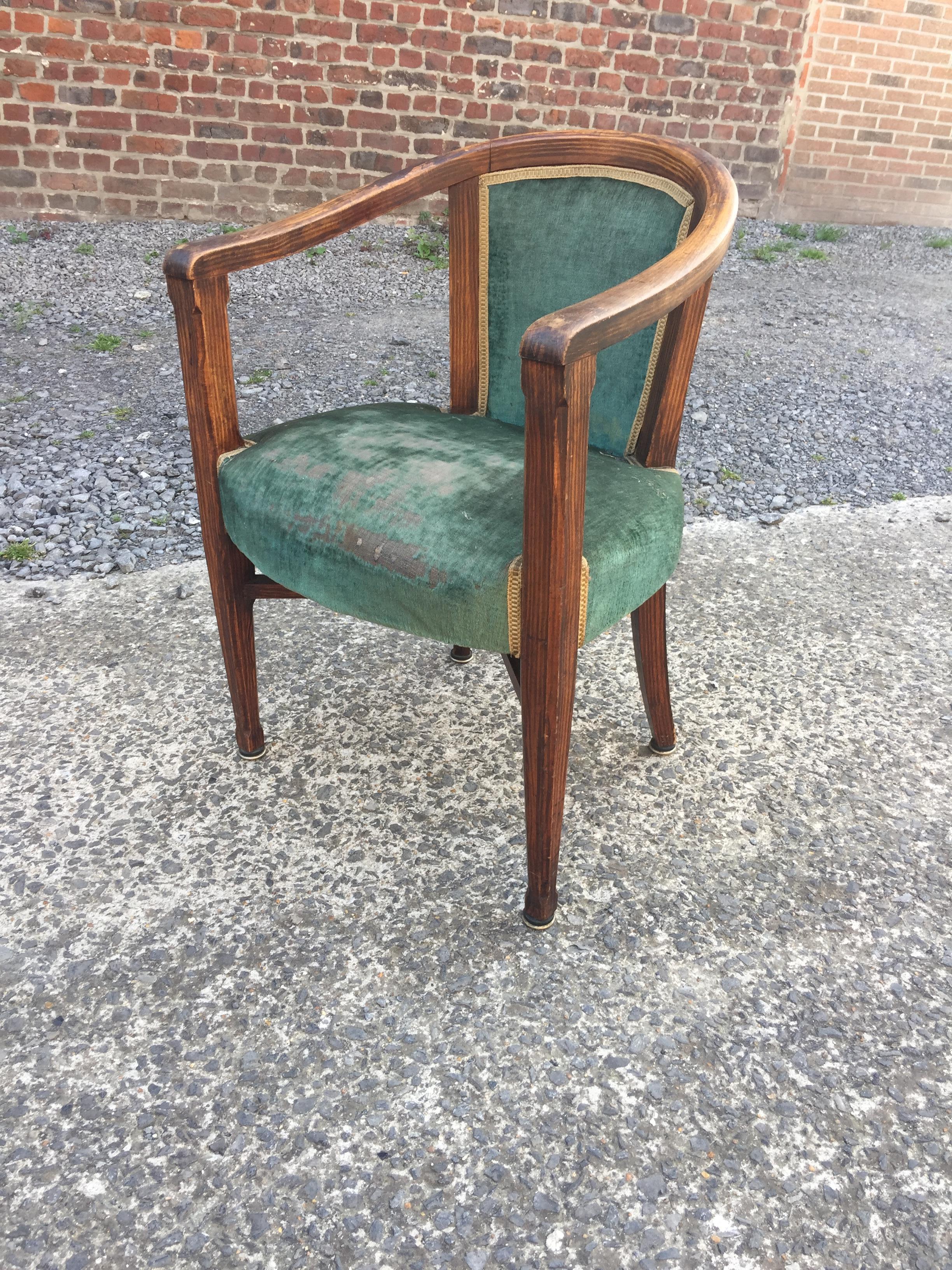 Art Deco armchair, in wood painted faux wood decor, circa 1925.
 