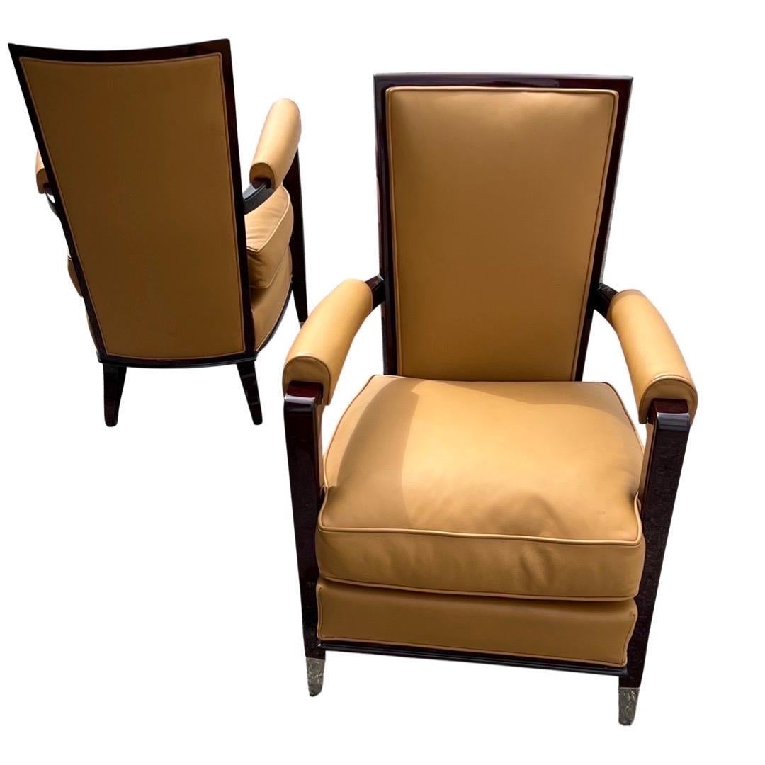 Pair of Rosewood armchairs covered in caramel colored Leather and Silver plated sabots designed by the French Architect and designer Jean Pascaud.
Made in France
Circa: 1935.