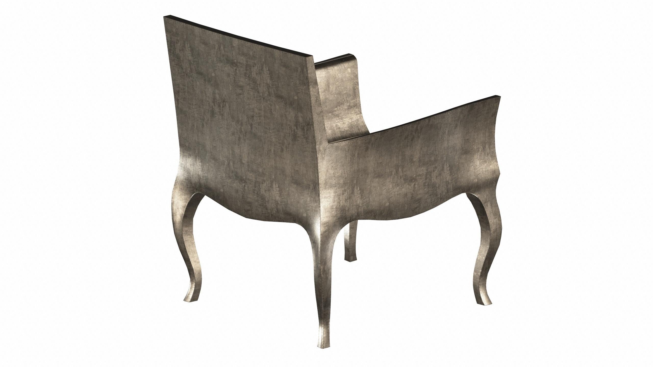 Metal Art Deco Armchairs Fine Hammered in Antique White Bronze by Paul Mathieu For Sale