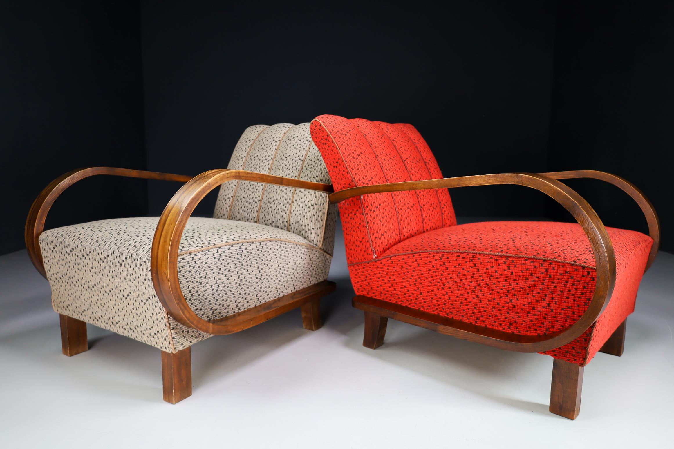 Pair of two original Art-Deco armchairs or lounge chairs manufactured and designed in Austria 1920s. Made of bentwood and with the original fabric. These armchairs would make an eye-catching addition to any interior such as living room, family room,