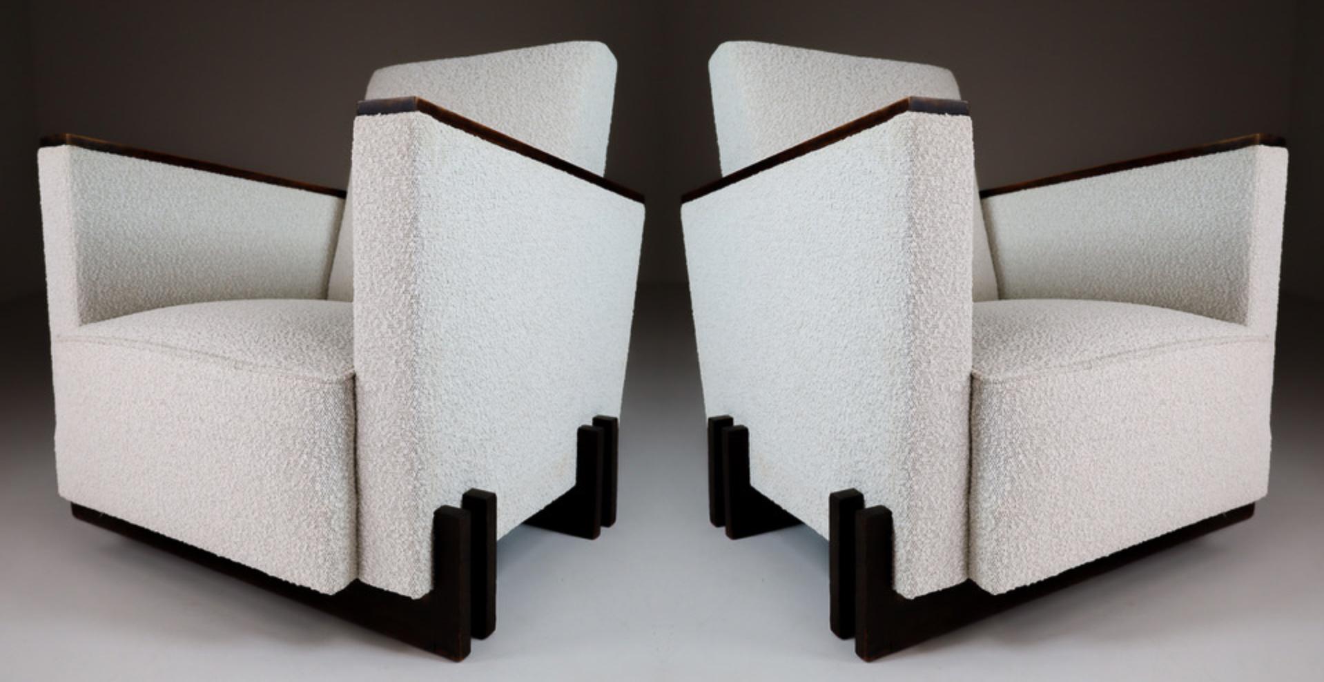 Pair of two Art-Deco lounge / arm chairs, in patinated wood and Re-upholstered Boucle wool fabric, France, 1930s. These armchairs would make an eye-catching addition to any interior such as living room, family room, screening room or even in the