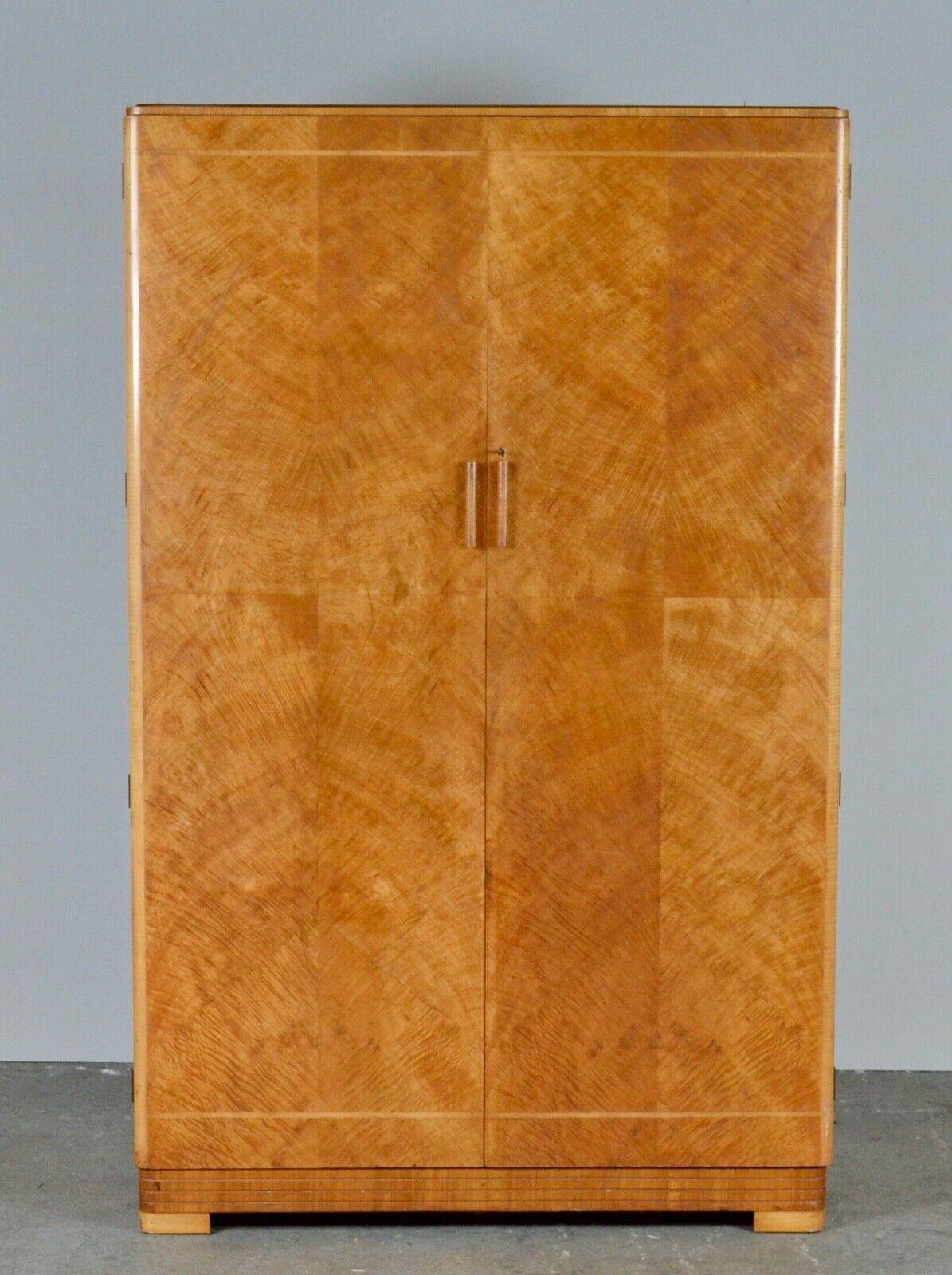 We are delighted to offer for sale this mid 20th century Army & Navy Ltd Art Deco style Maple wardrobe. A very good-looking double wardrobe the wood is rich maple and glows in the light, it has a small shelf and generous hanging space. It’s a very